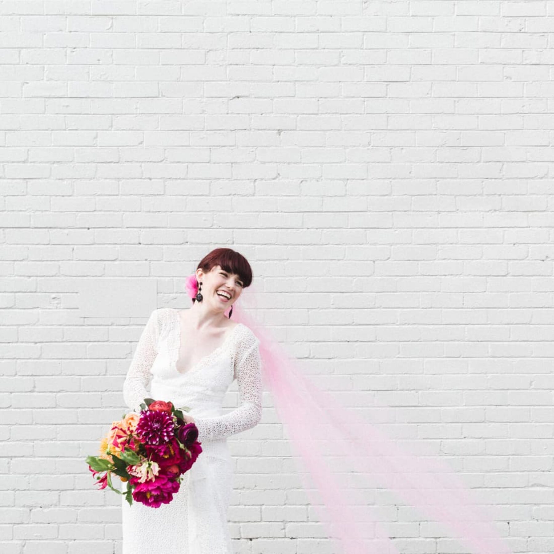 bride with pink tulle veil