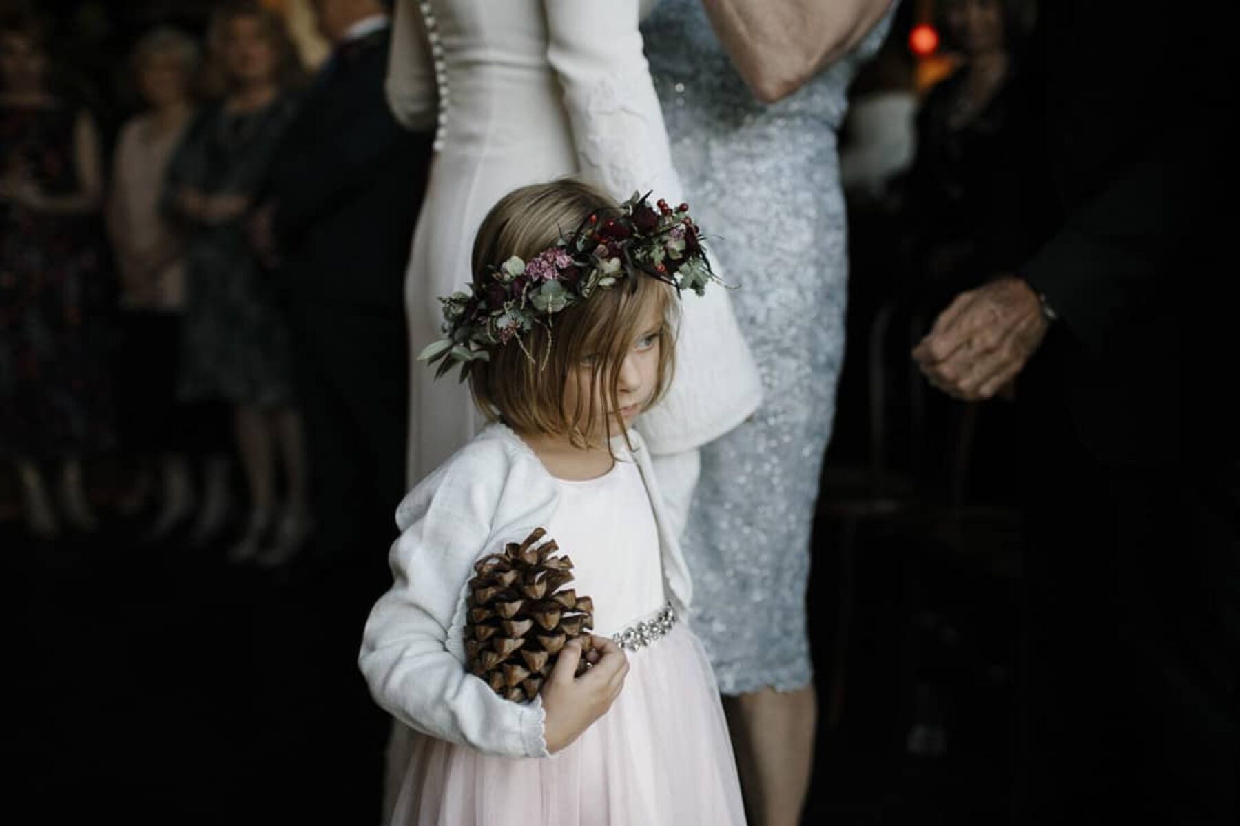 flower girl with pine cone