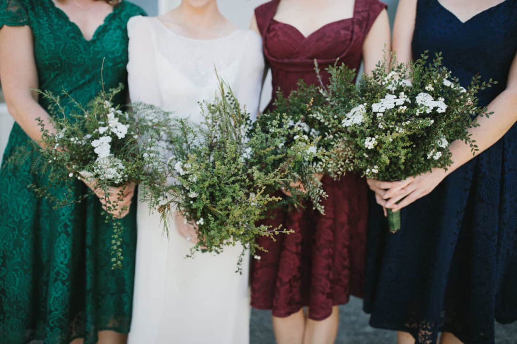 mismatched vintage bridesmaids with foraged bouquets