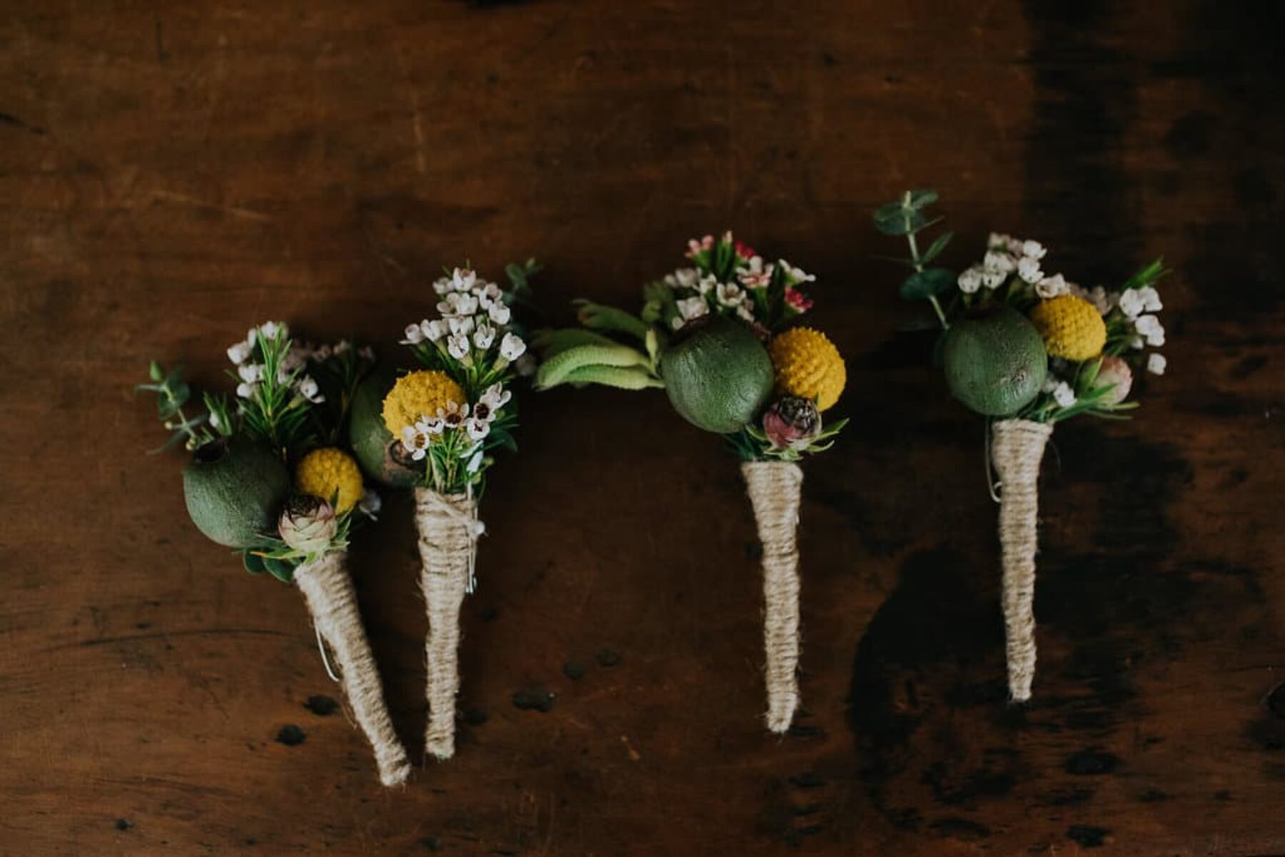 boutonniere with gum nuts and native flowers