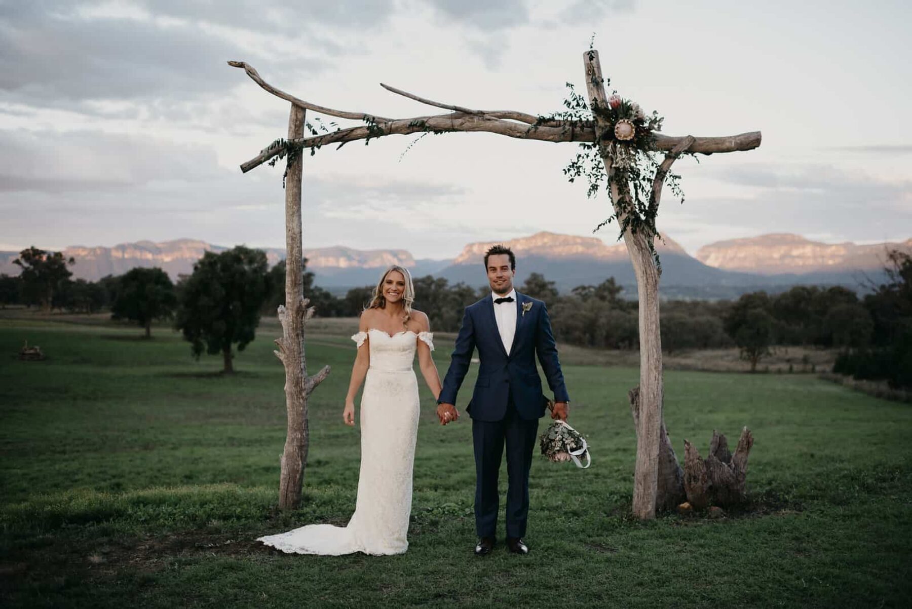 DIY timber wedding arch with native flowers