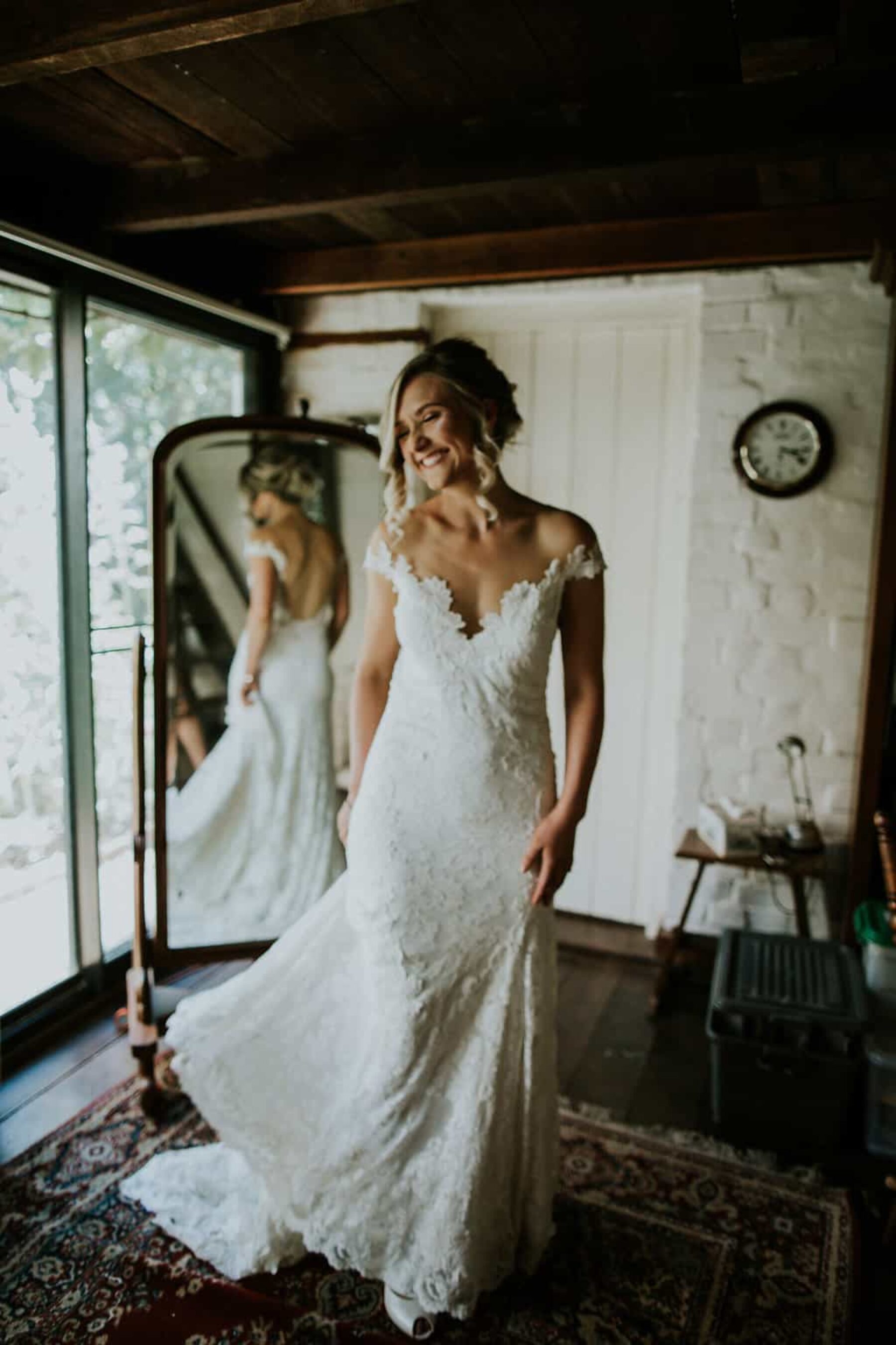 Lace off-shoulder wedding dress by Olvi's