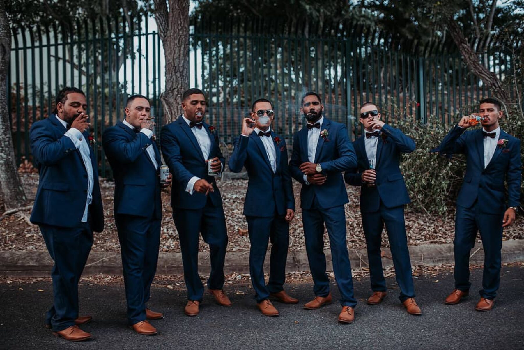 cigar-smoking groomsmen