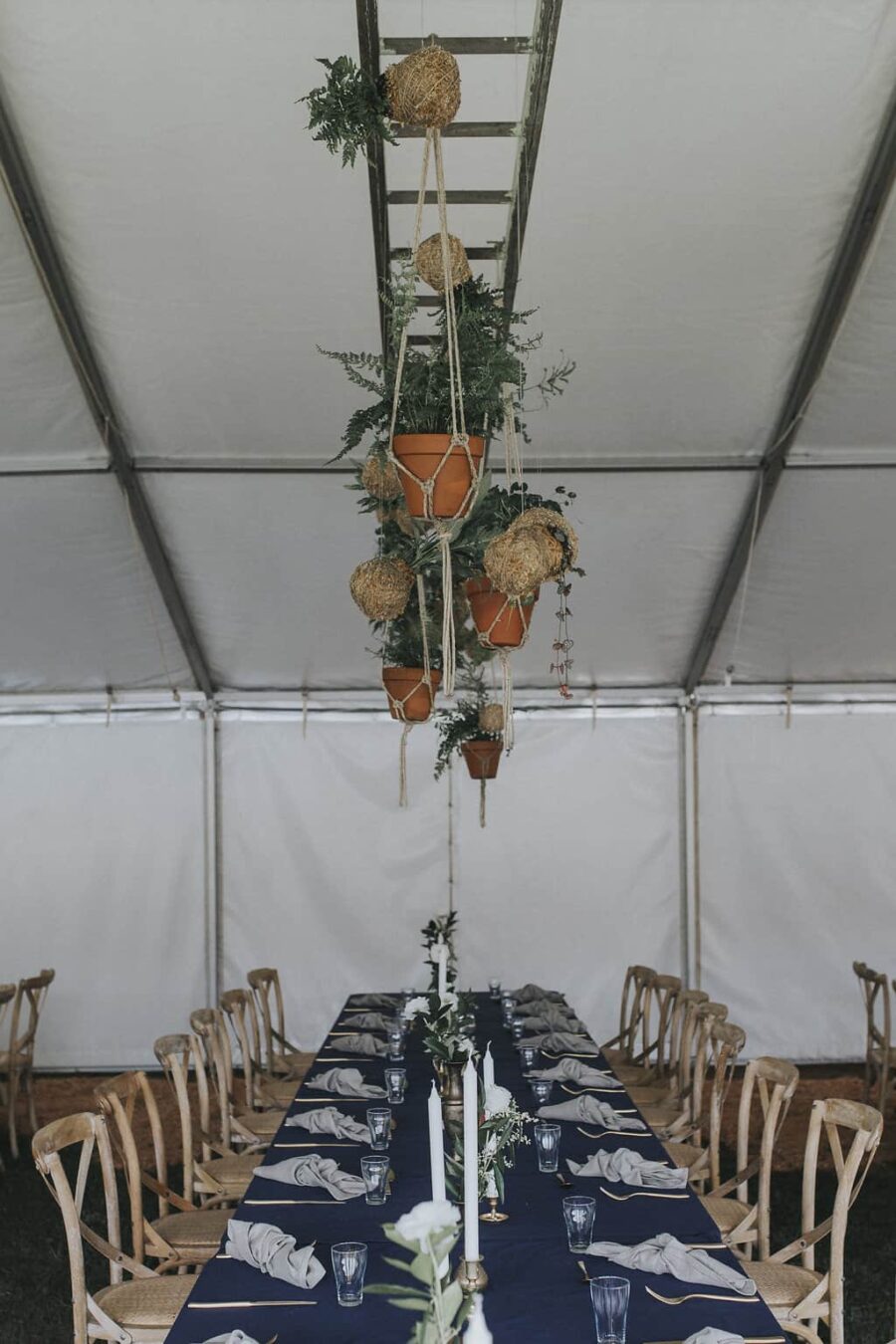 marquee wedding with hanging plants and kokedamas