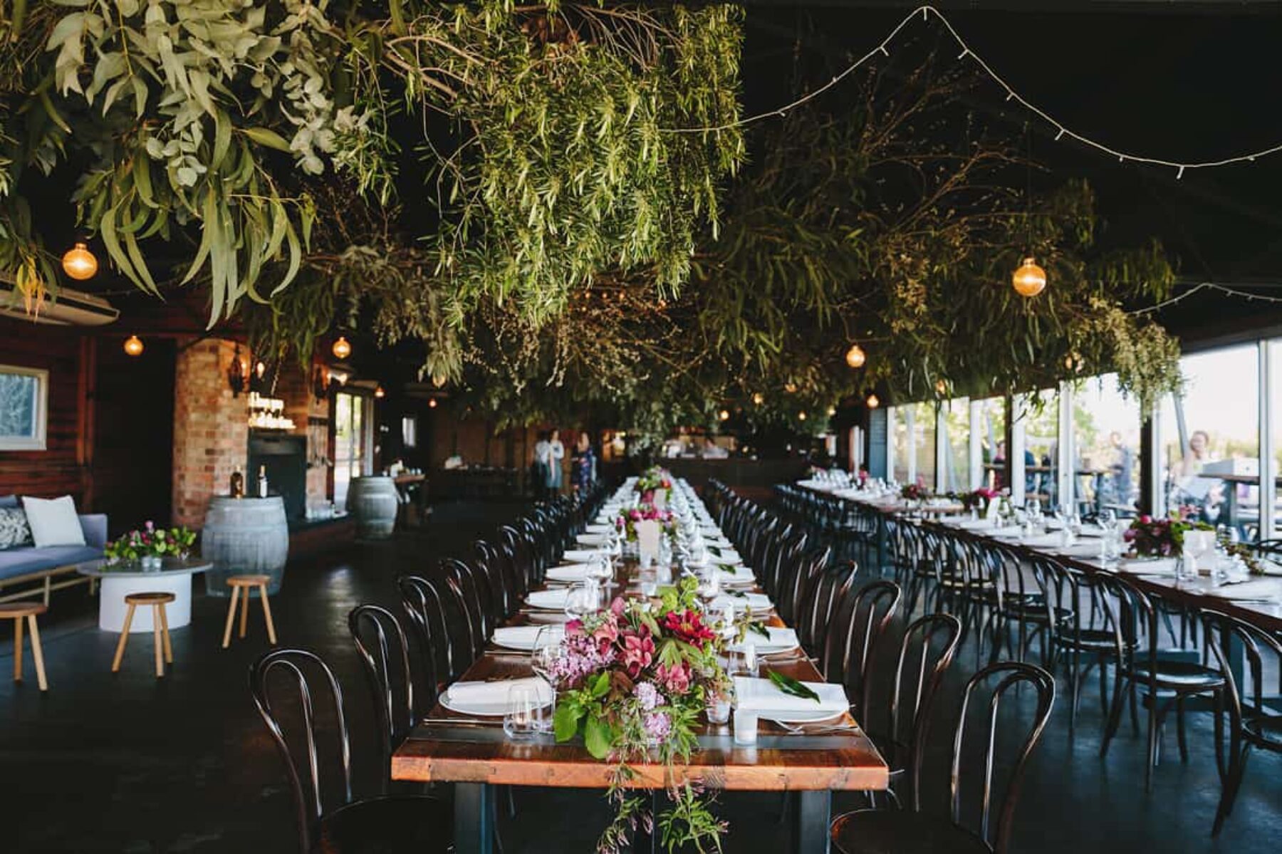 rustic wedding with hanging foliage installations