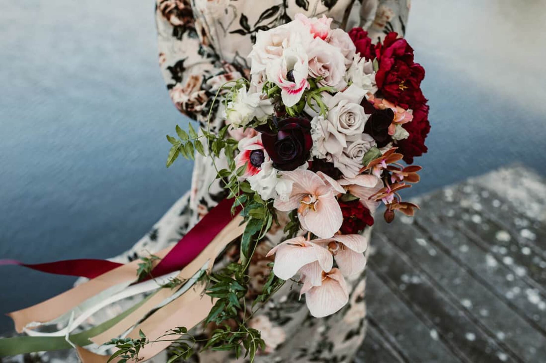 red and pink bridal bouquet with orchids