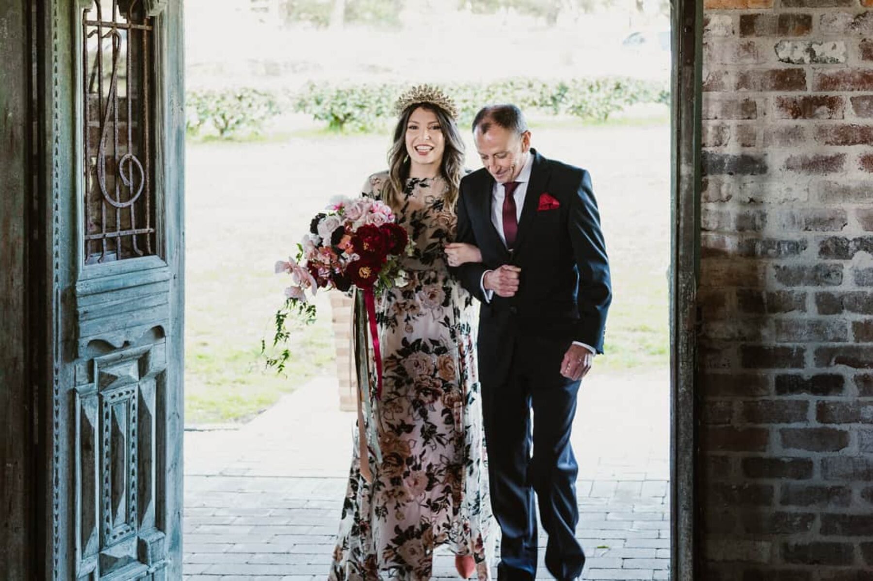unique bride in floral long sleeve wedding dress