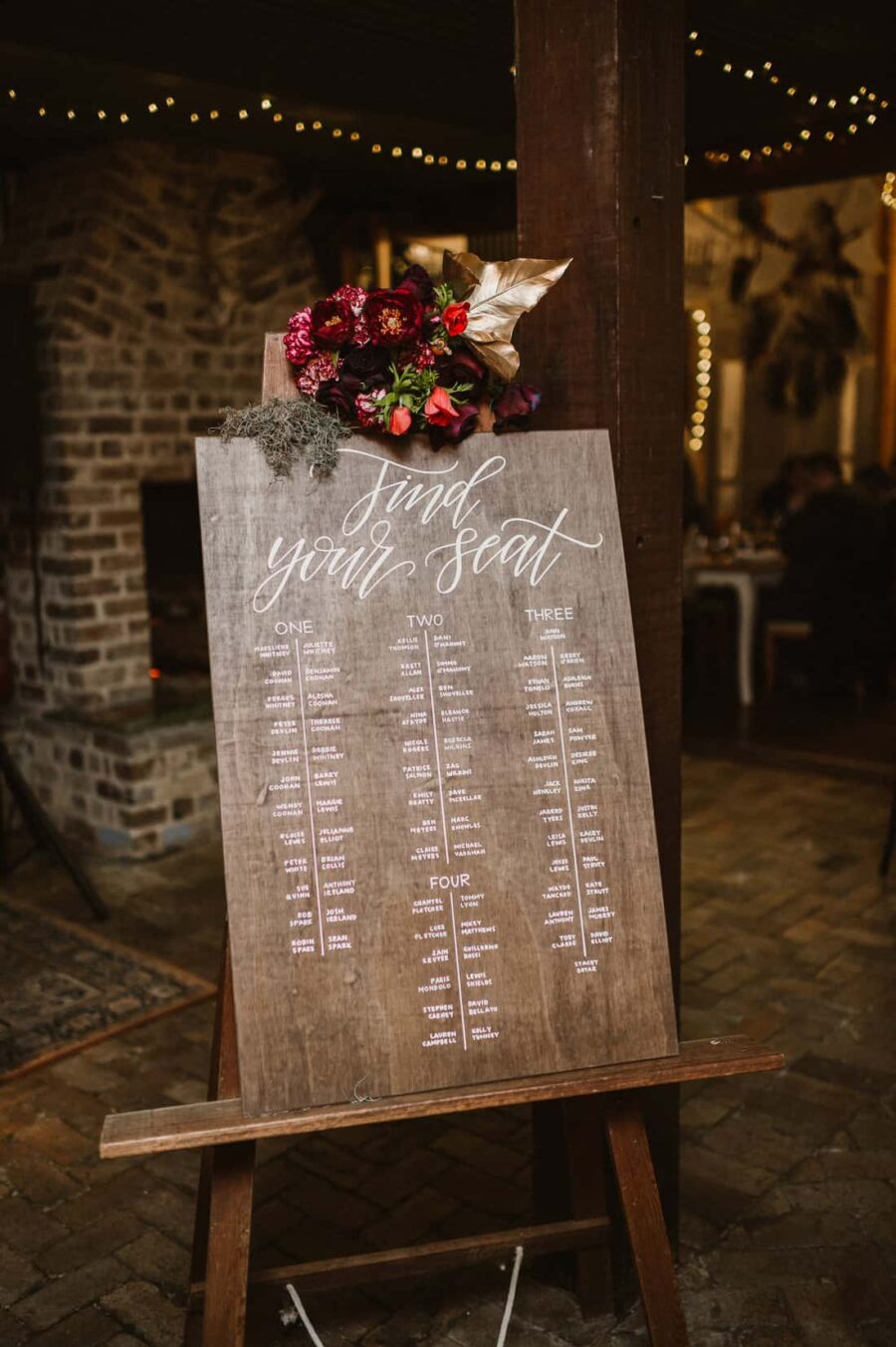 timber hand-lettered wedding seating planner