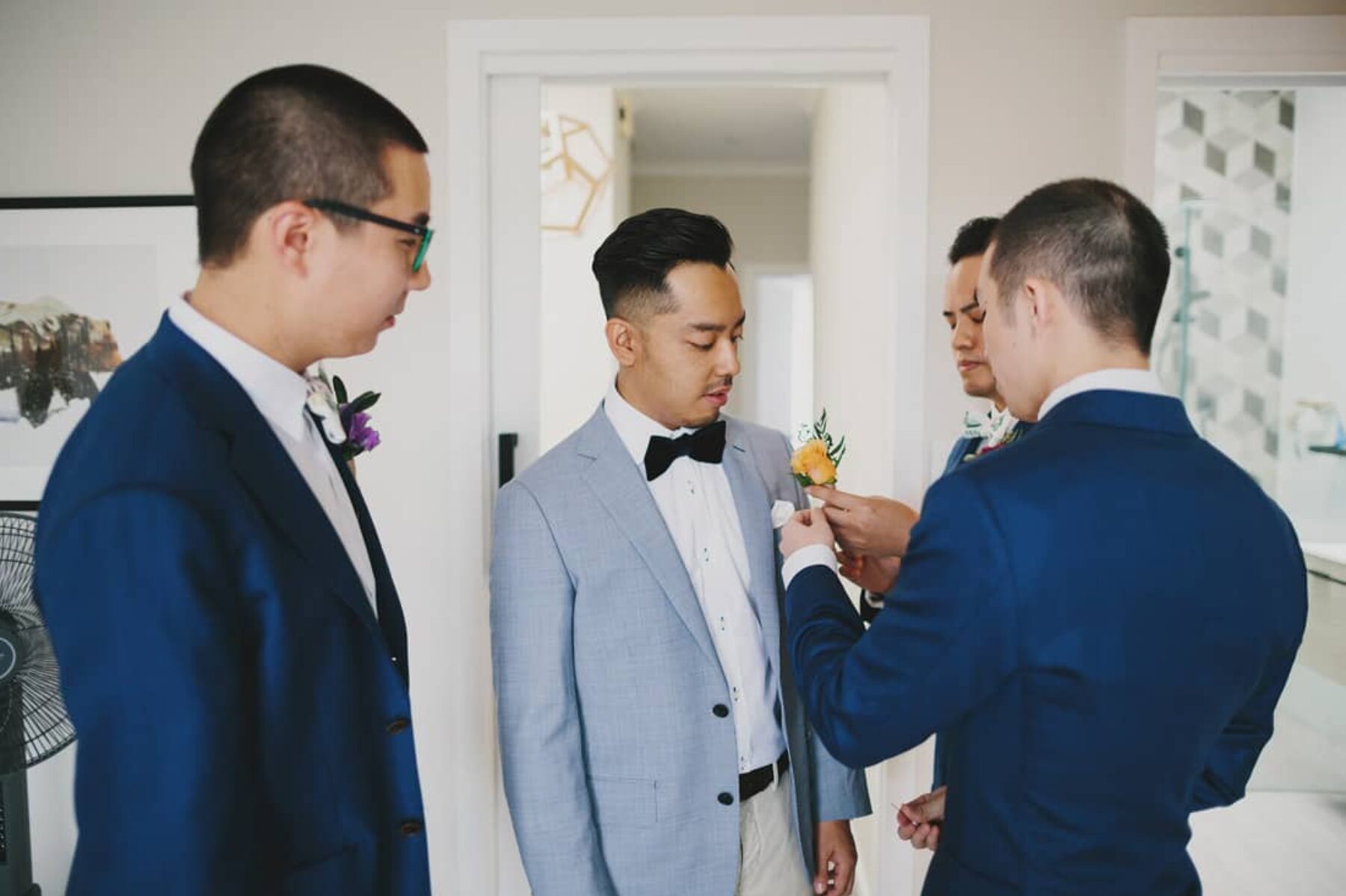 groom and groomsmen in mixed blue blazers