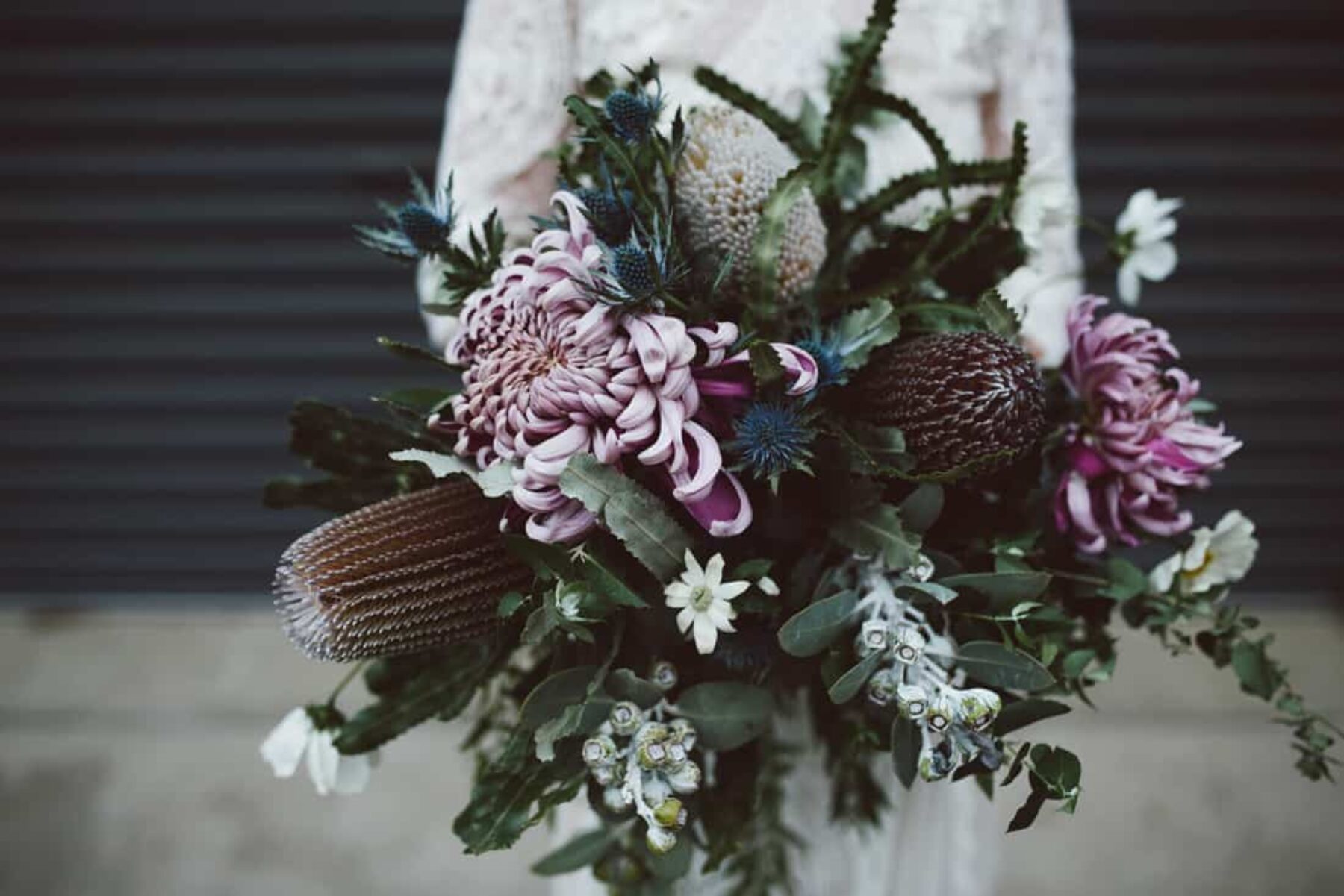 lilac-toned bridal bouquet with banksia and native greenery