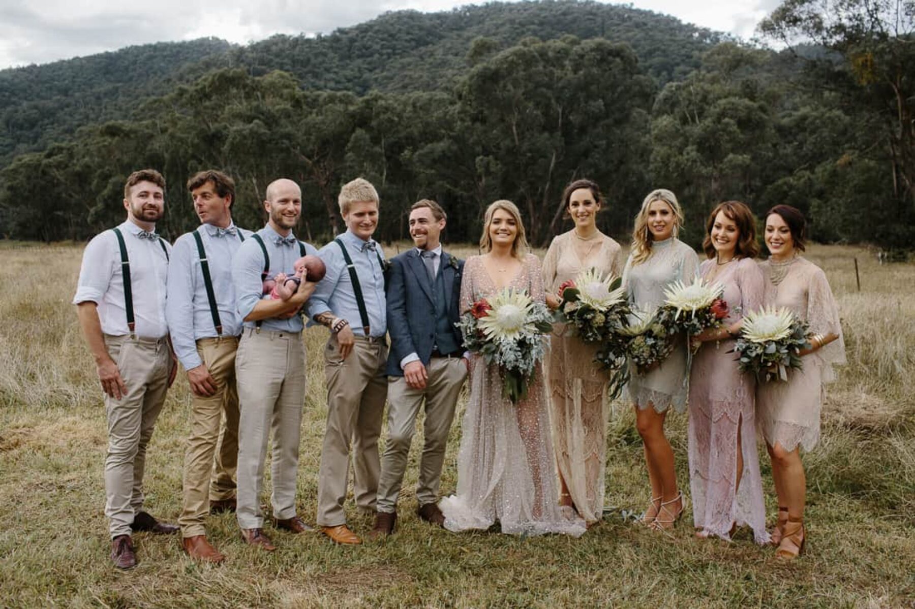 bride and bridesmaids in mixed pastel hues