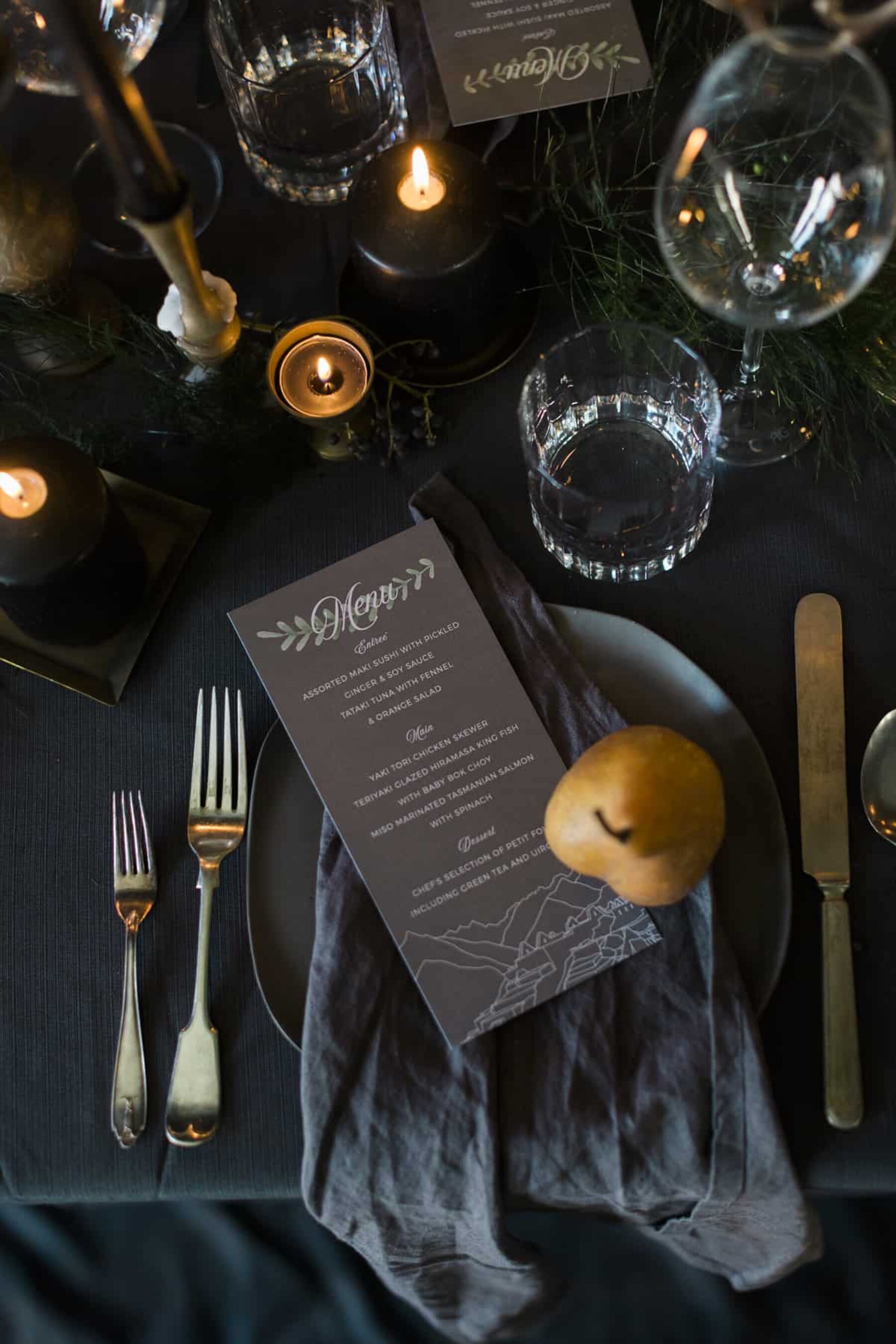 opulent tablescape with gold cutlery