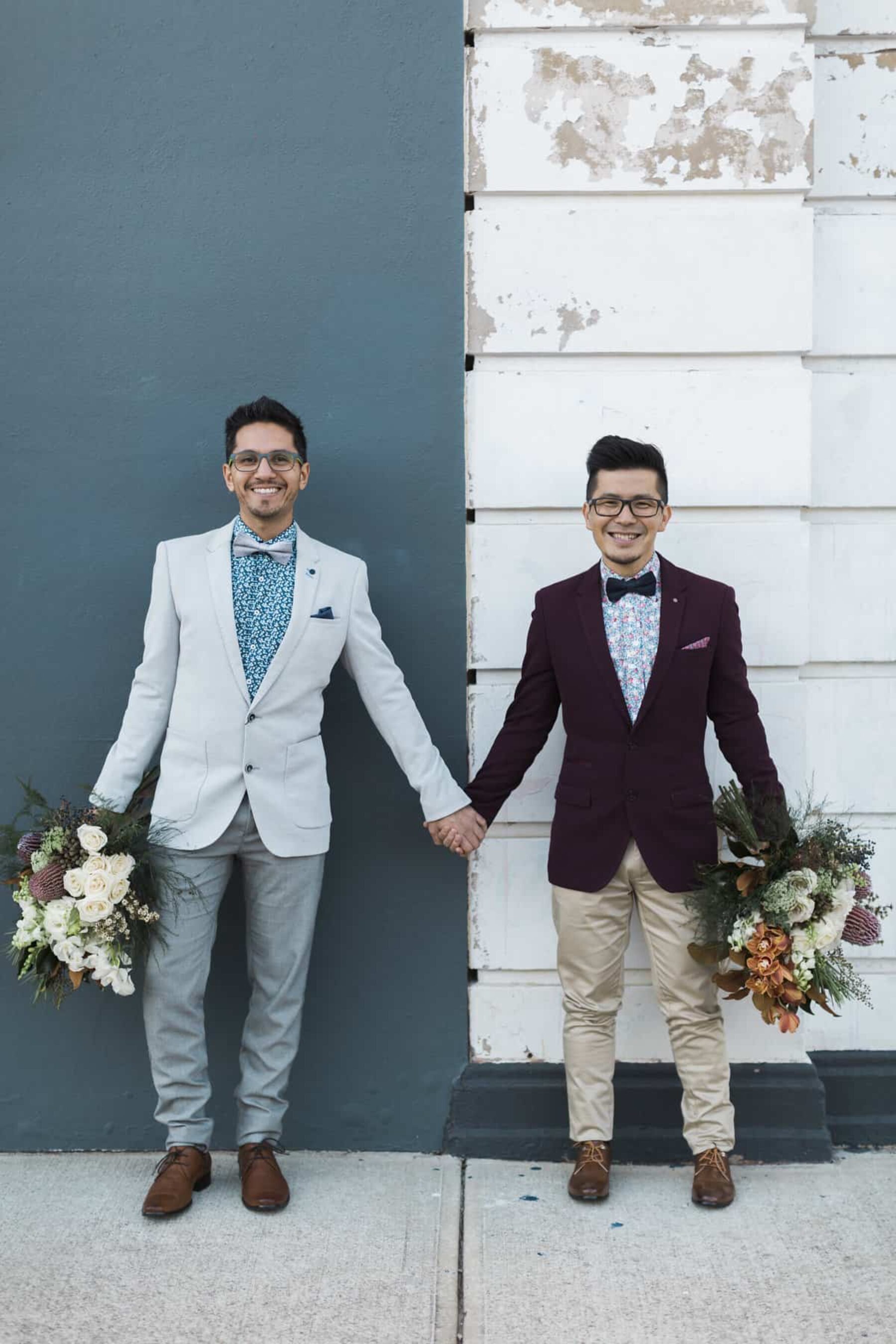 stylish grooms with blooms