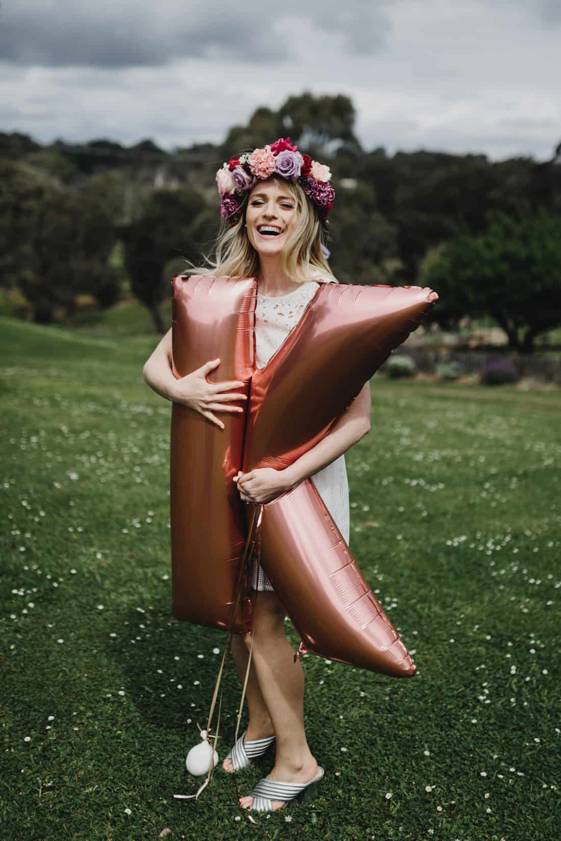 bride-to-be with giant letter K balloon