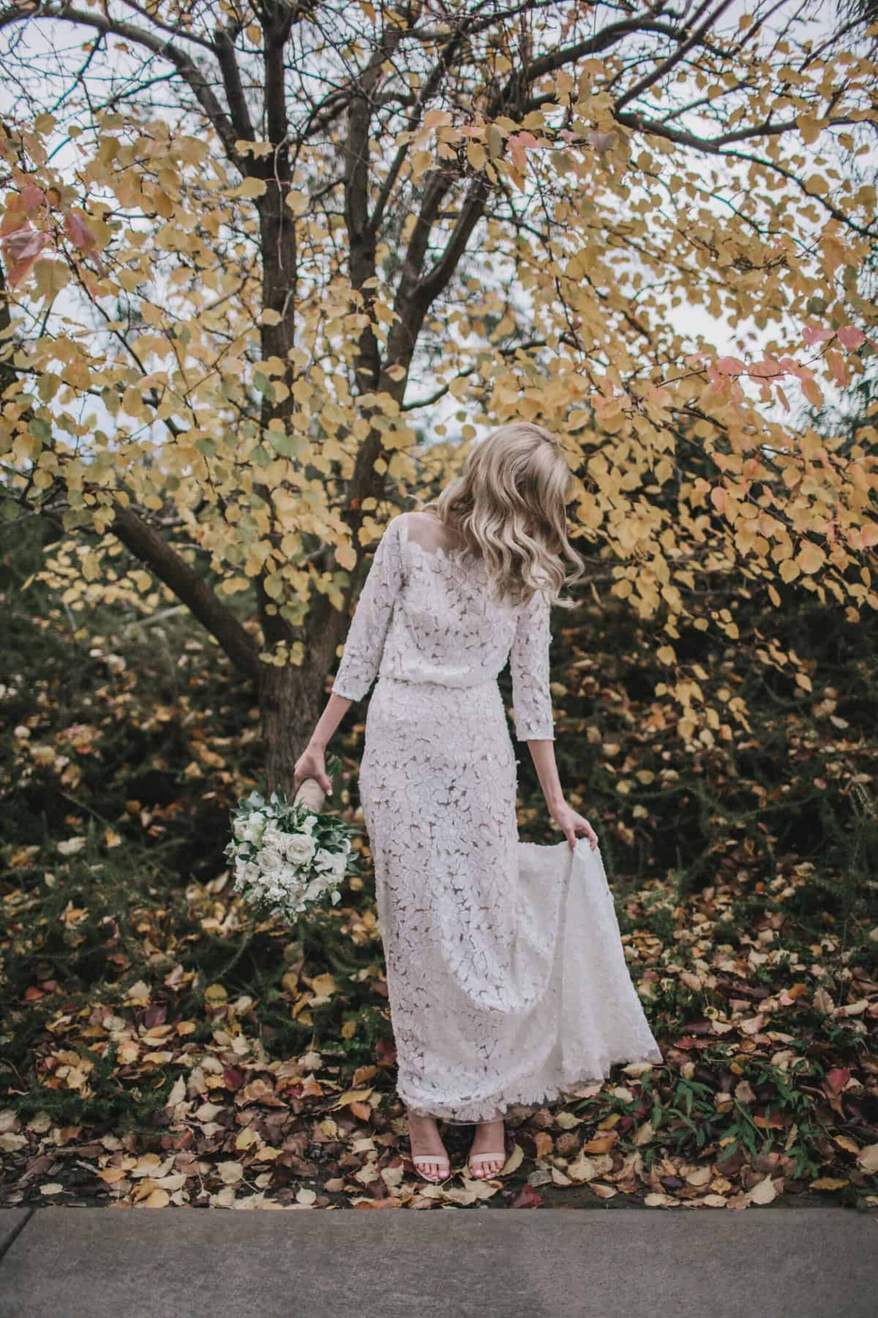 floral long sleeve lace wedding dress by Jennifer Gifford
