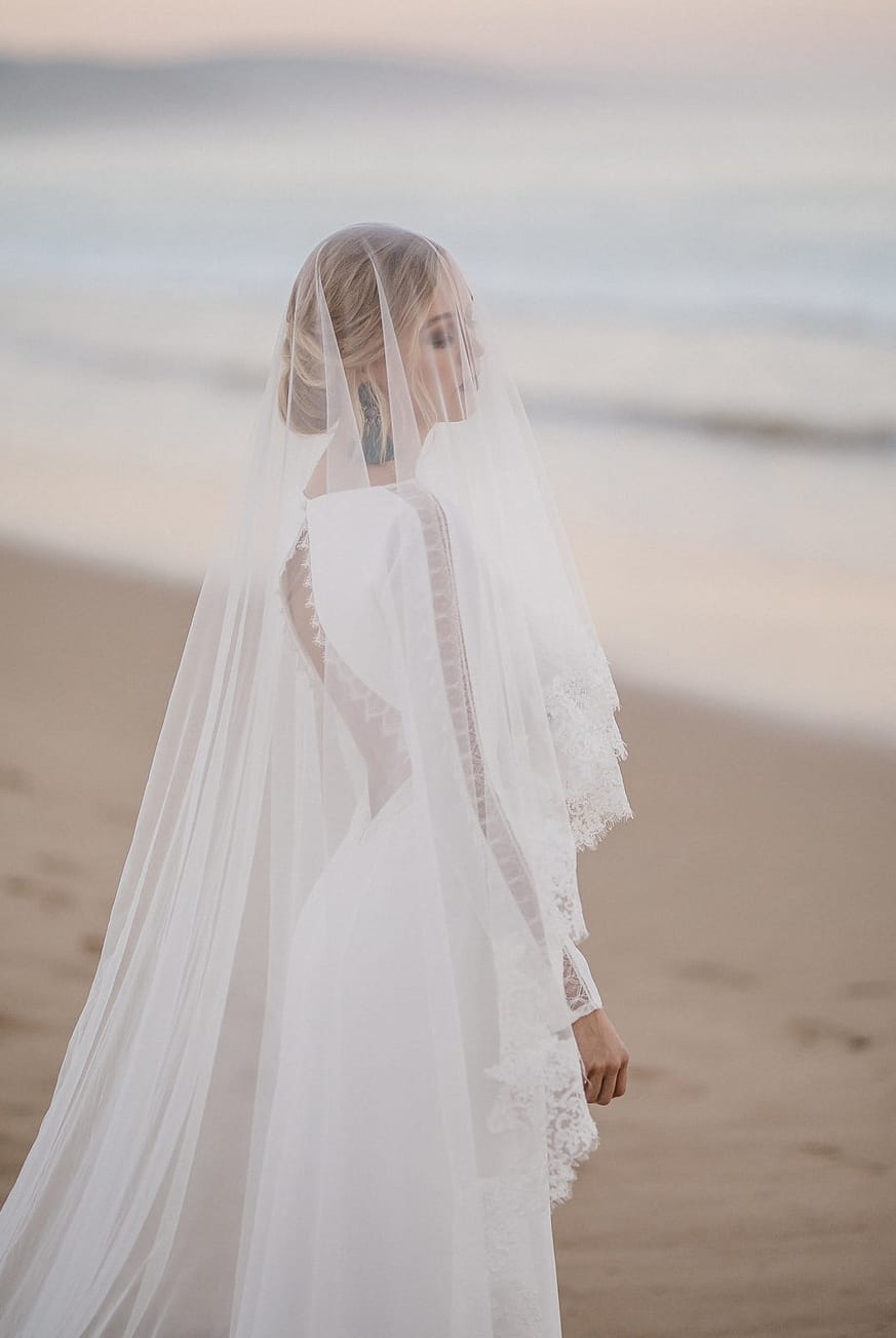 beach bride with cathedral veil