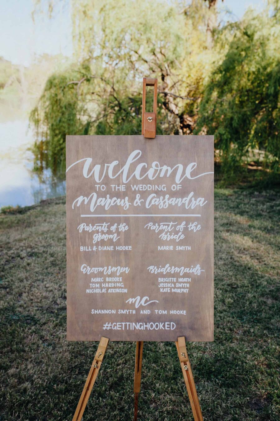 wooden hand-lettered wedding signage