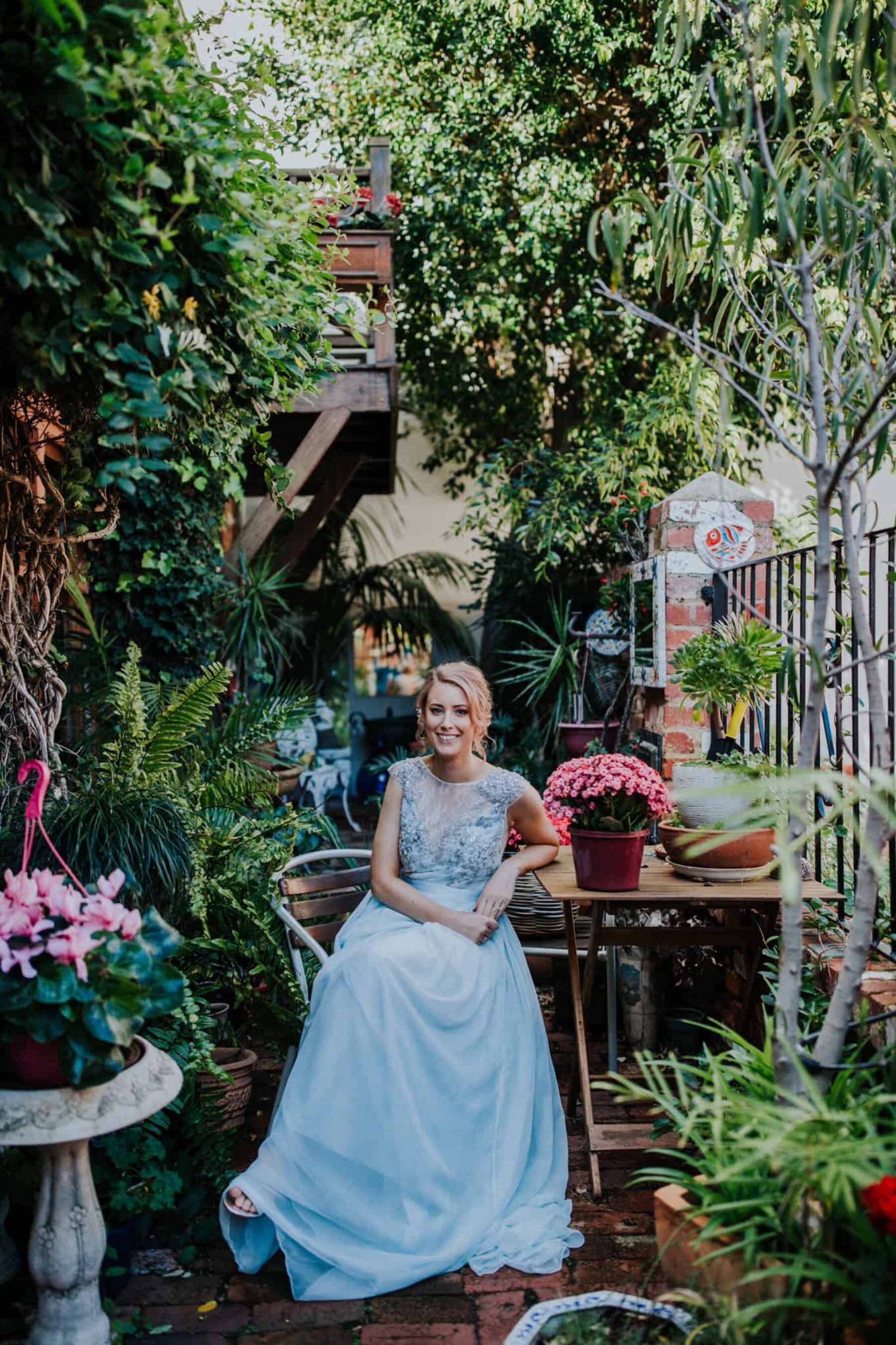 blush-haired bride with pale blue wedding dress