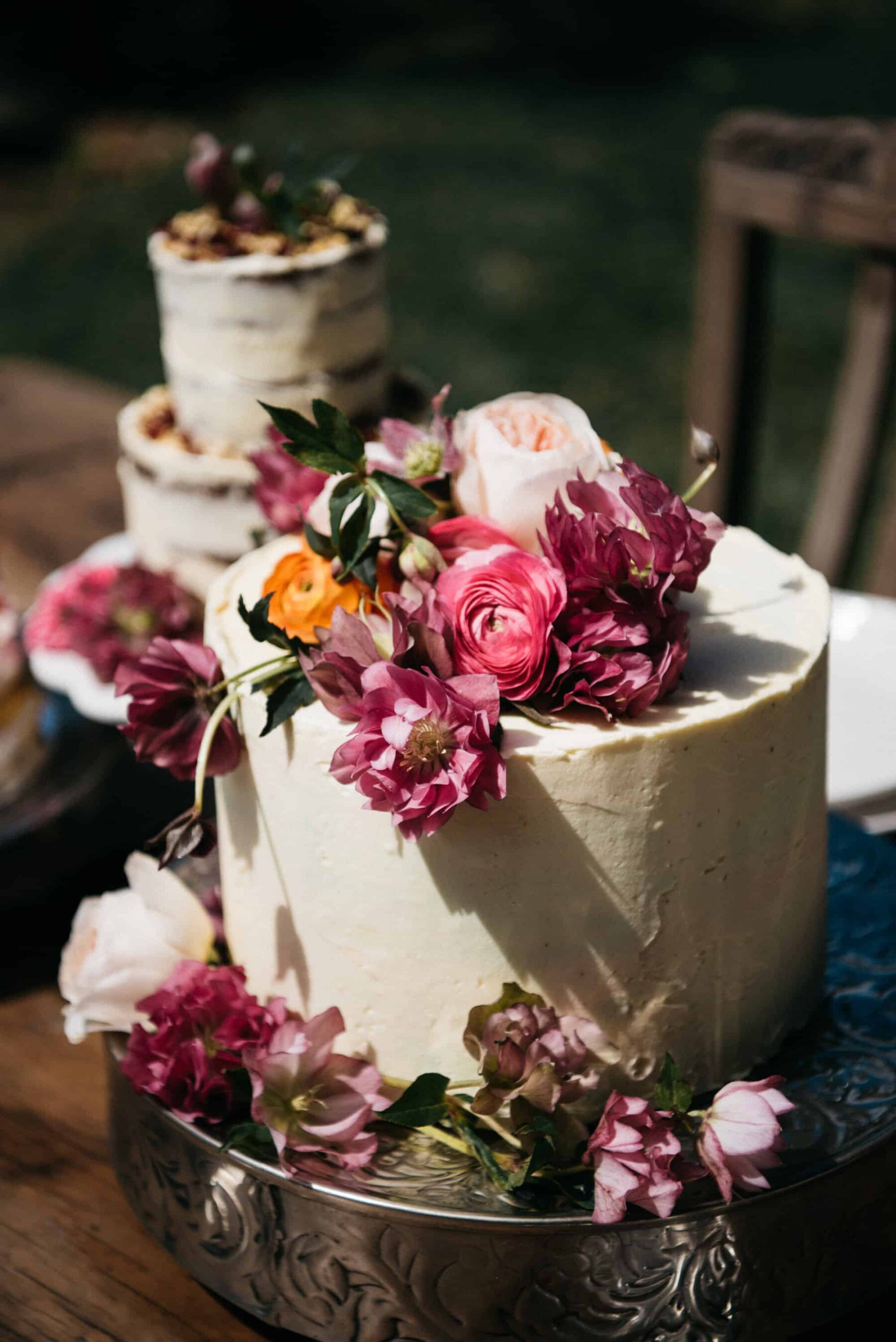 wedding cakes with fresh flower toppers