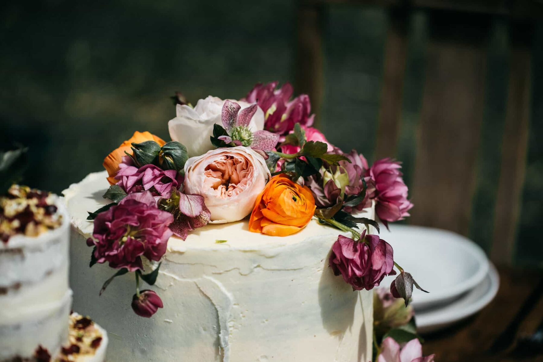 wedding cakes with fresh flower toppers