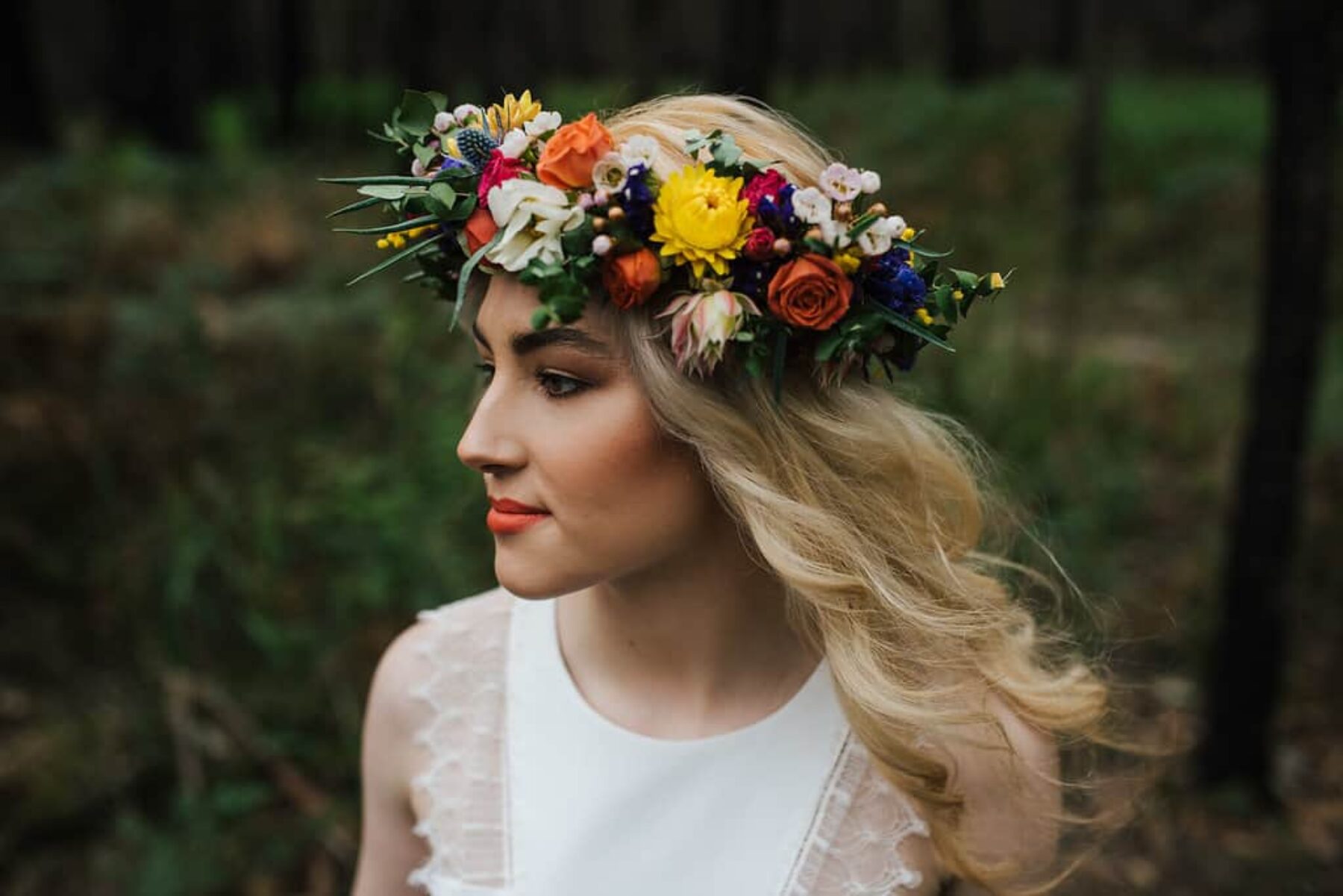 boho bride with colourful flower crown