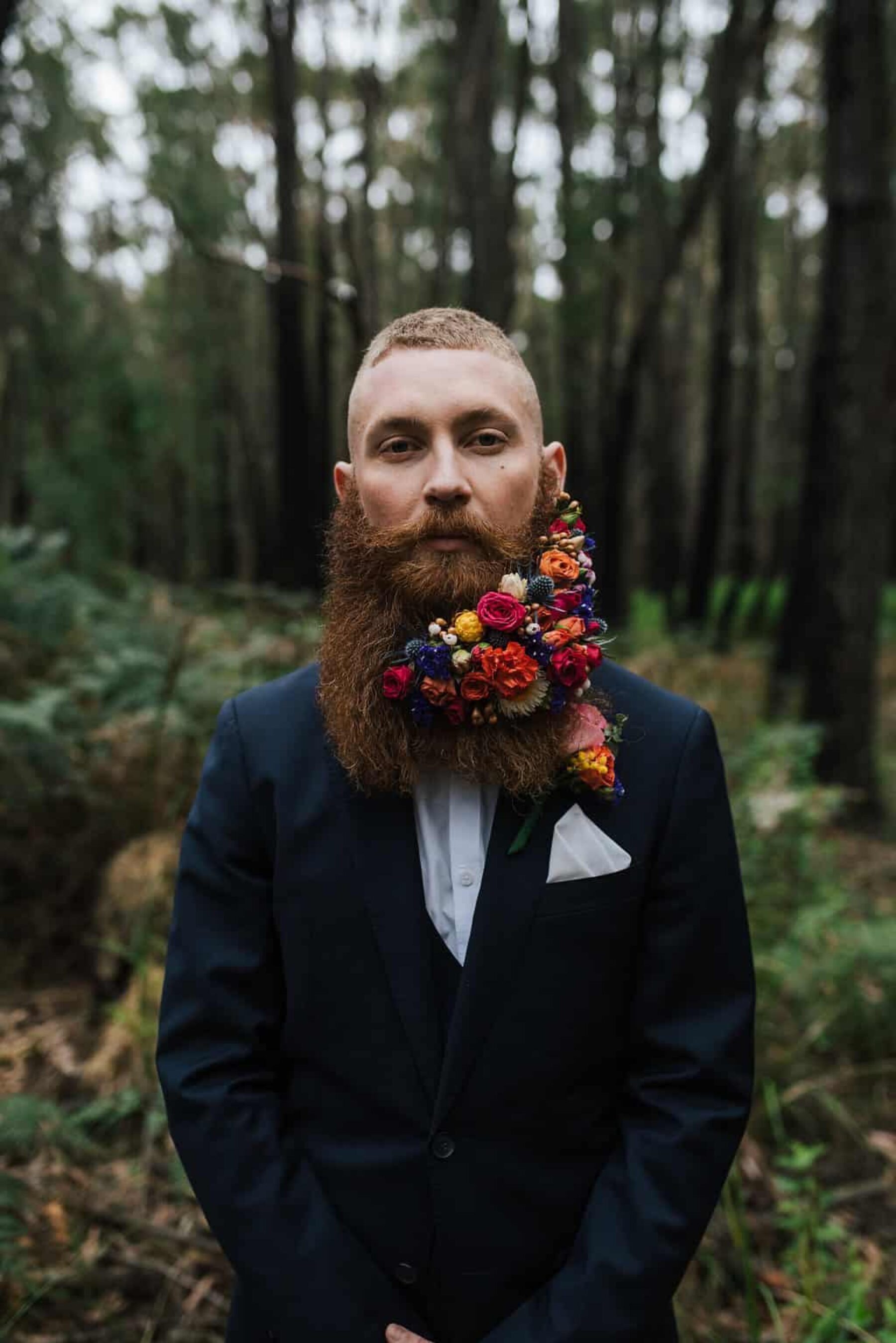 beard adorned with bright flowers