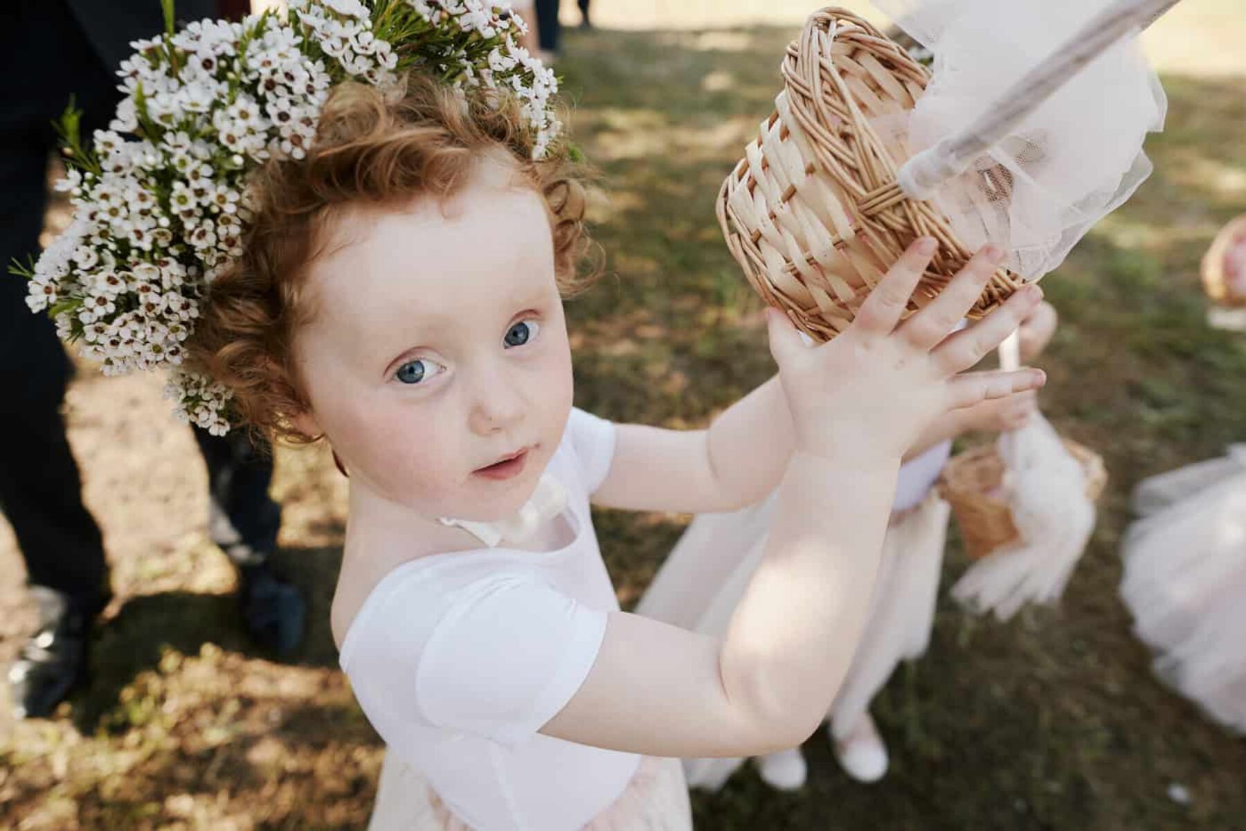 flower girl with white daisy crown
