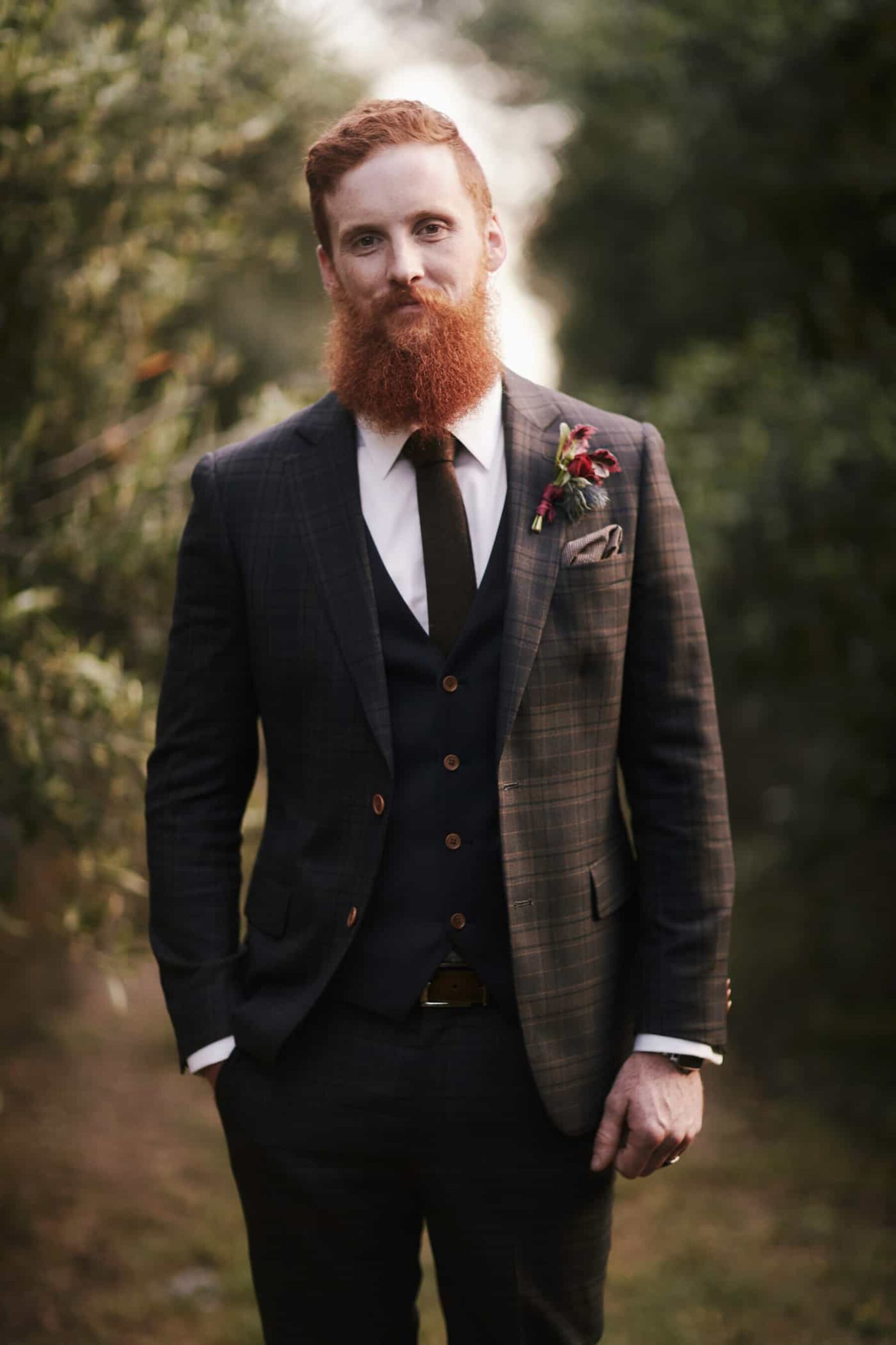 dapper red-bearded groom