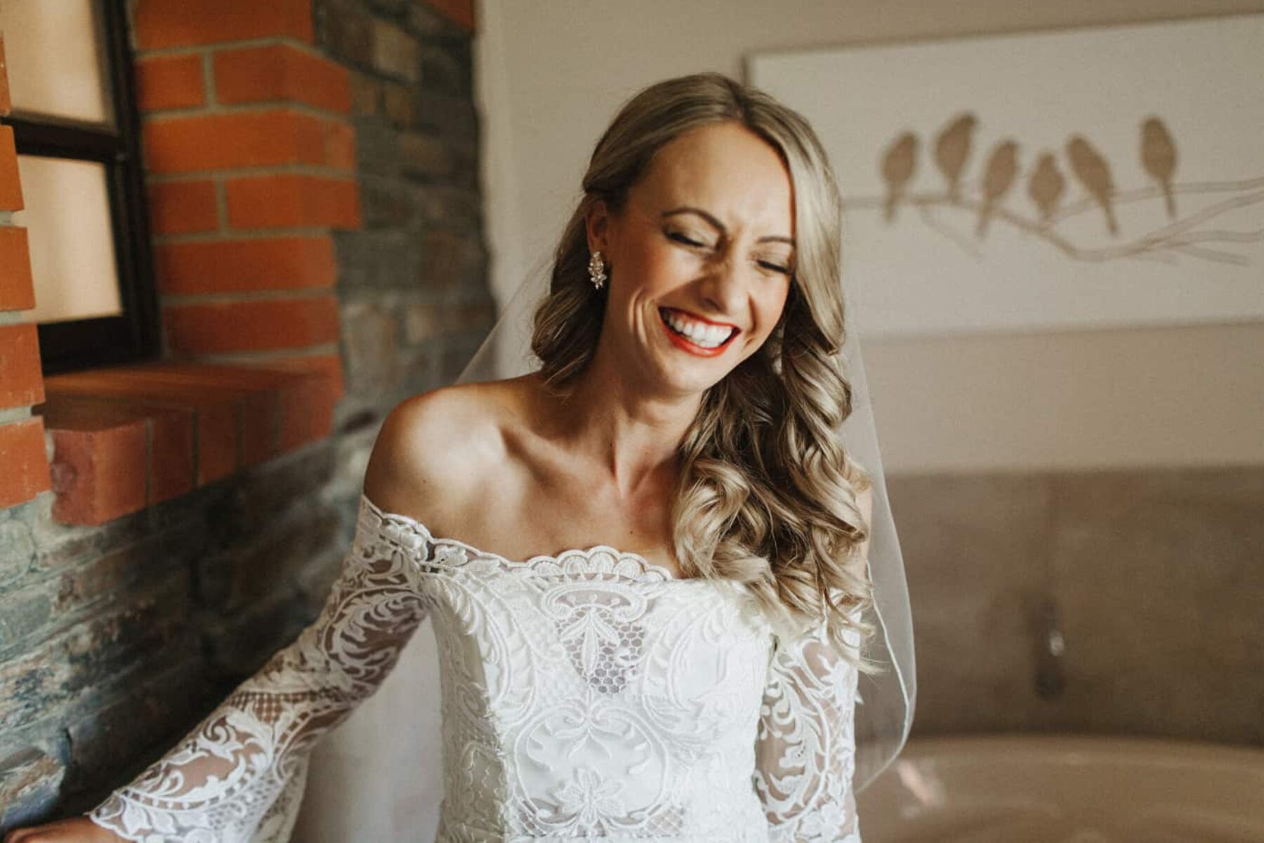 off-shoulder lace wedding dress by Thurley