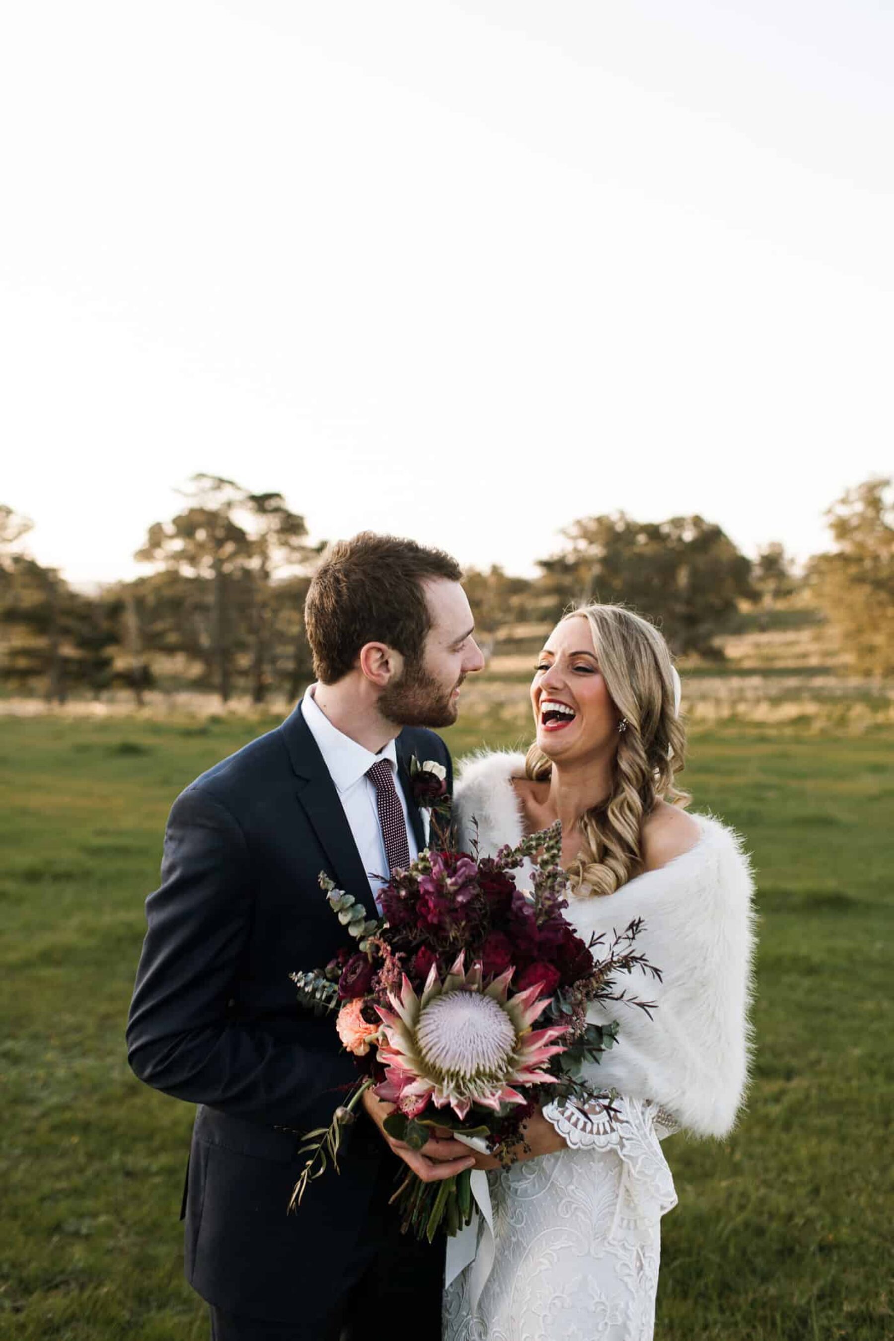 blush and burgundy bouquet with giant king protea