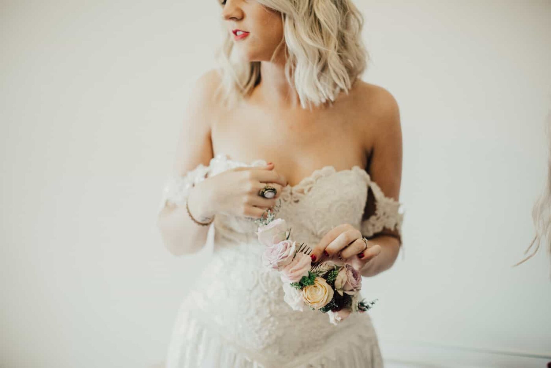 Boho bride in vintage lace strapless wedding dress