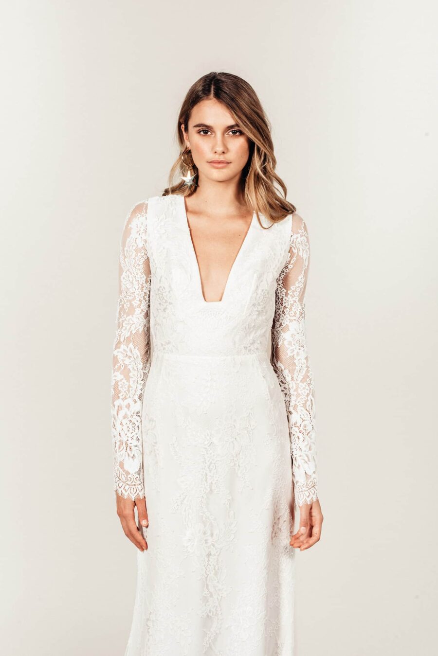 modern wedding dress with lace bell sleeves