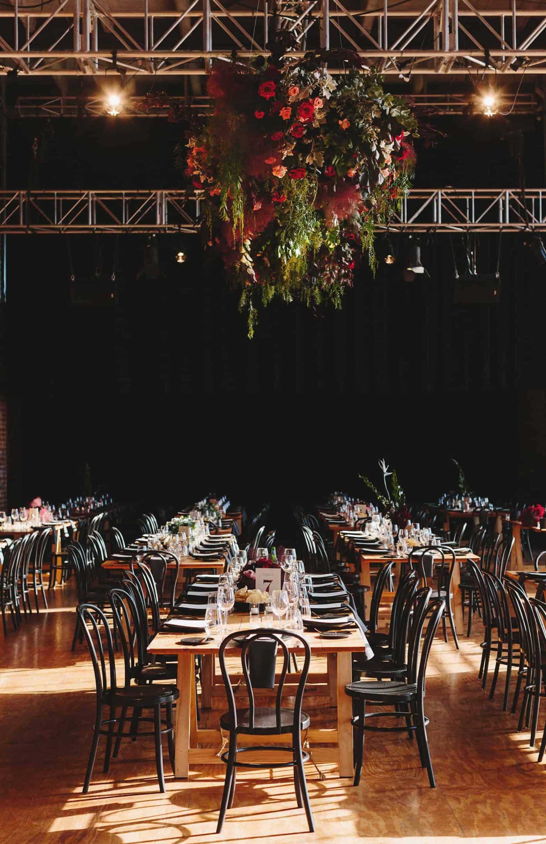 industrial wedding with hanging floral installations