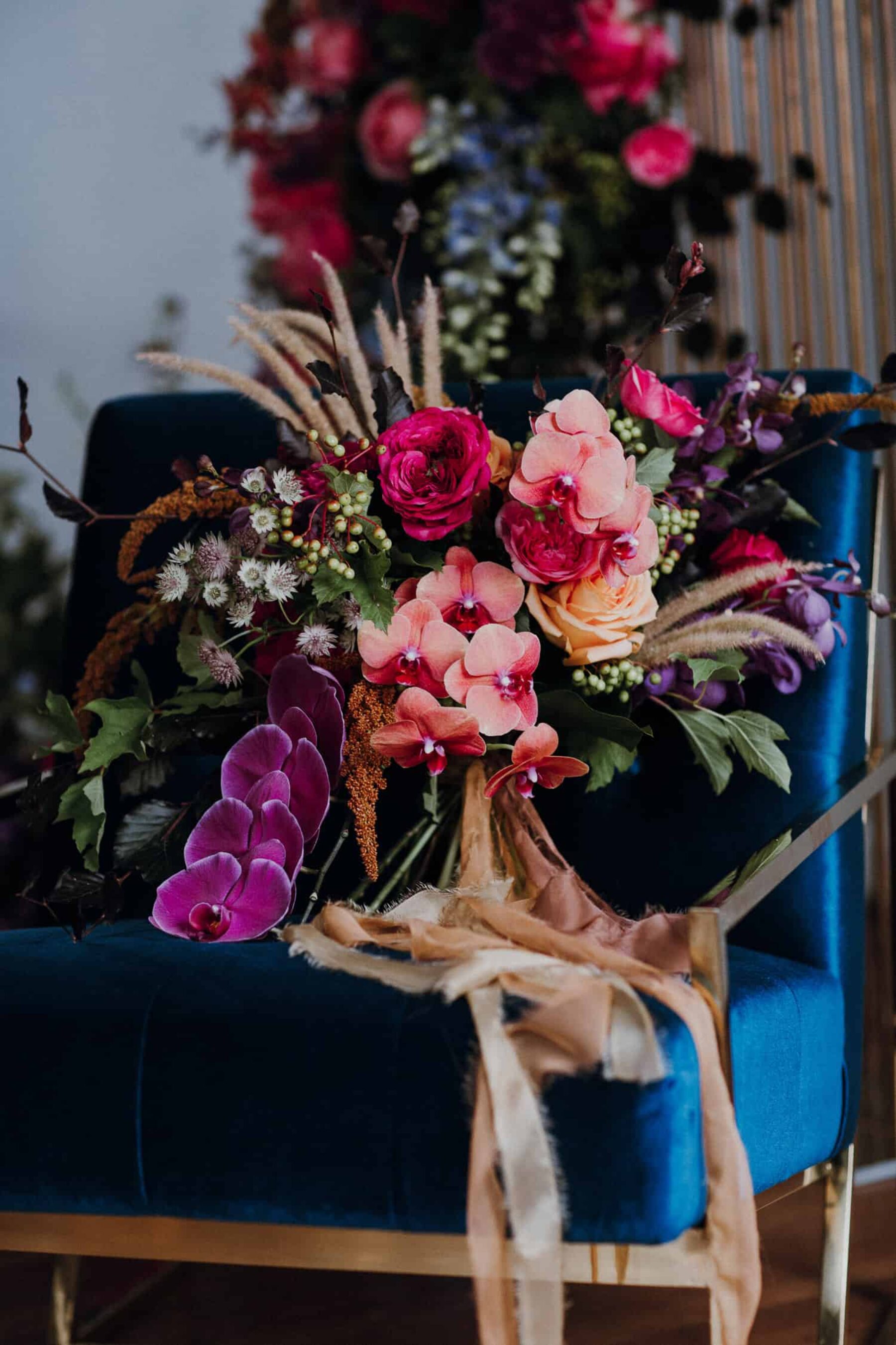 vibrant bridal bouquet with pink and magenta orchids