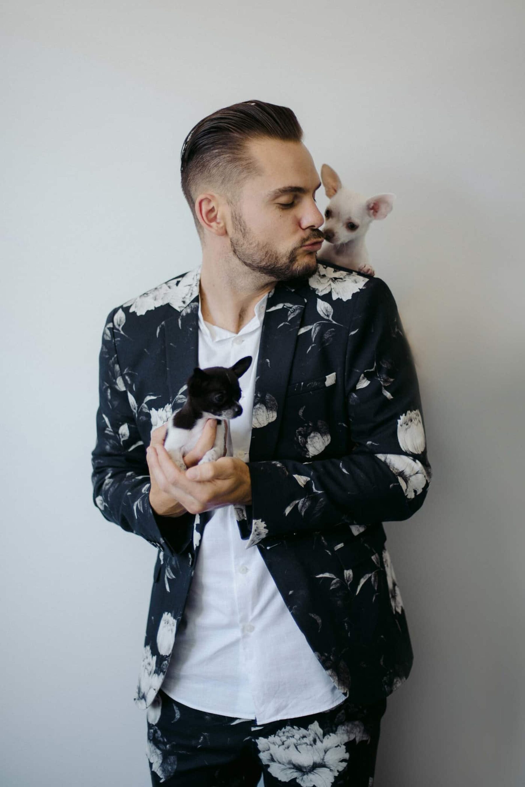 groom with chihuahua puppies