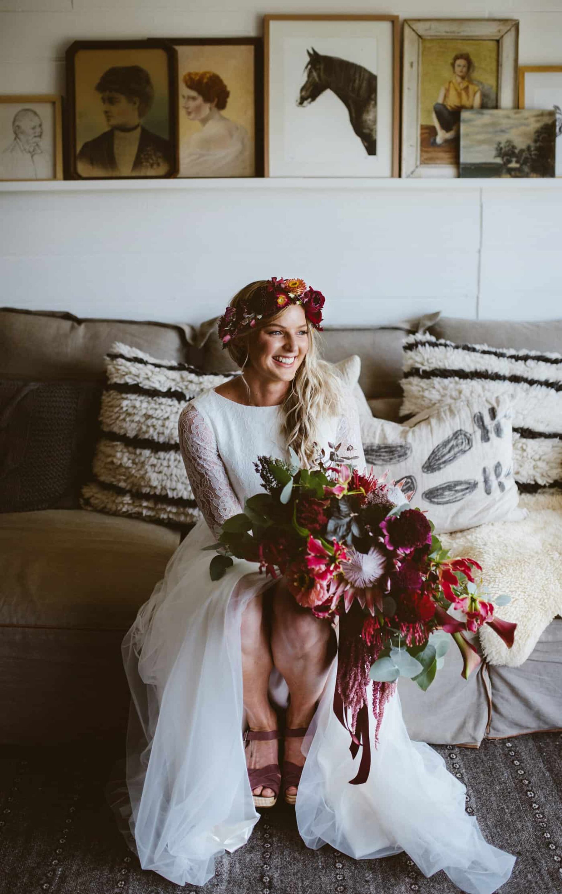 boho bride with oversize red and plum bouquet
