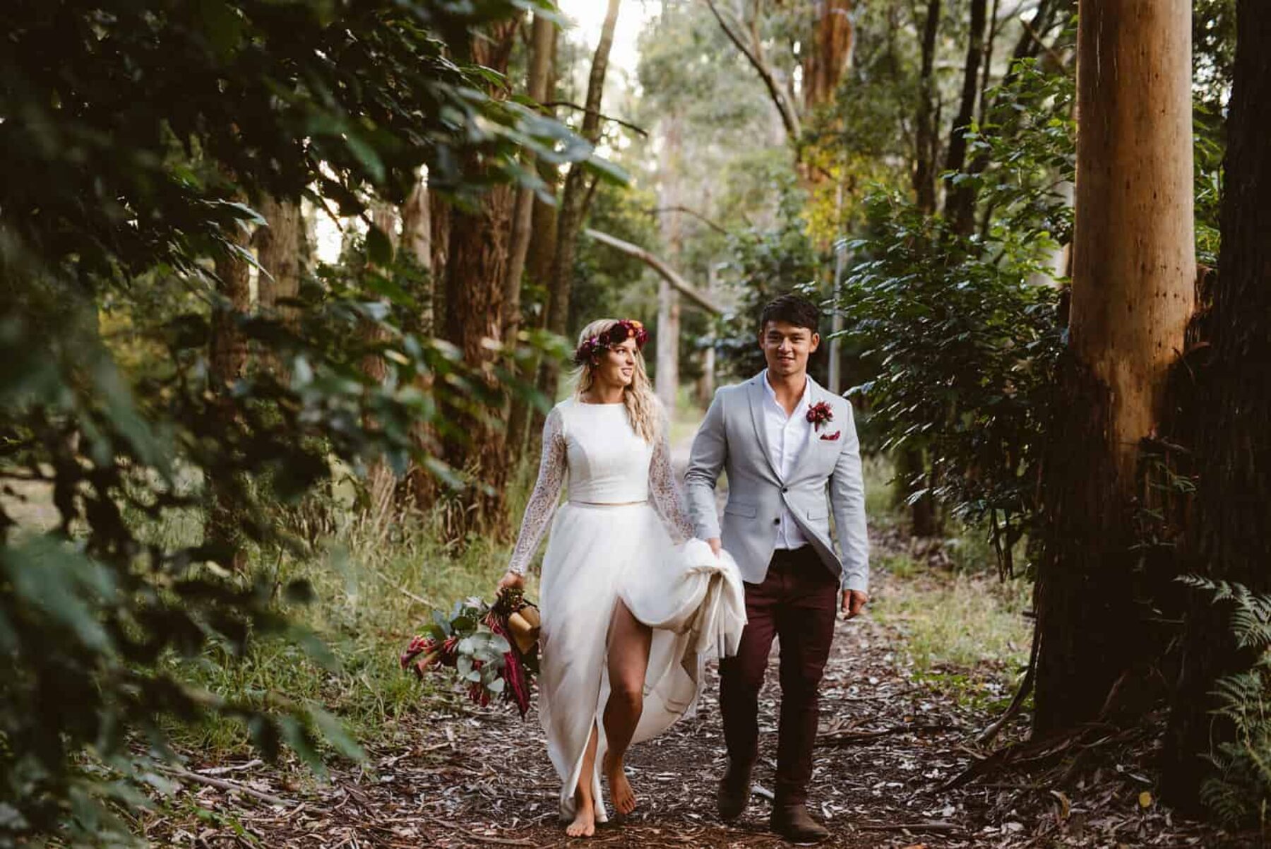 boho bride in two-piece wedding dress and flower crown