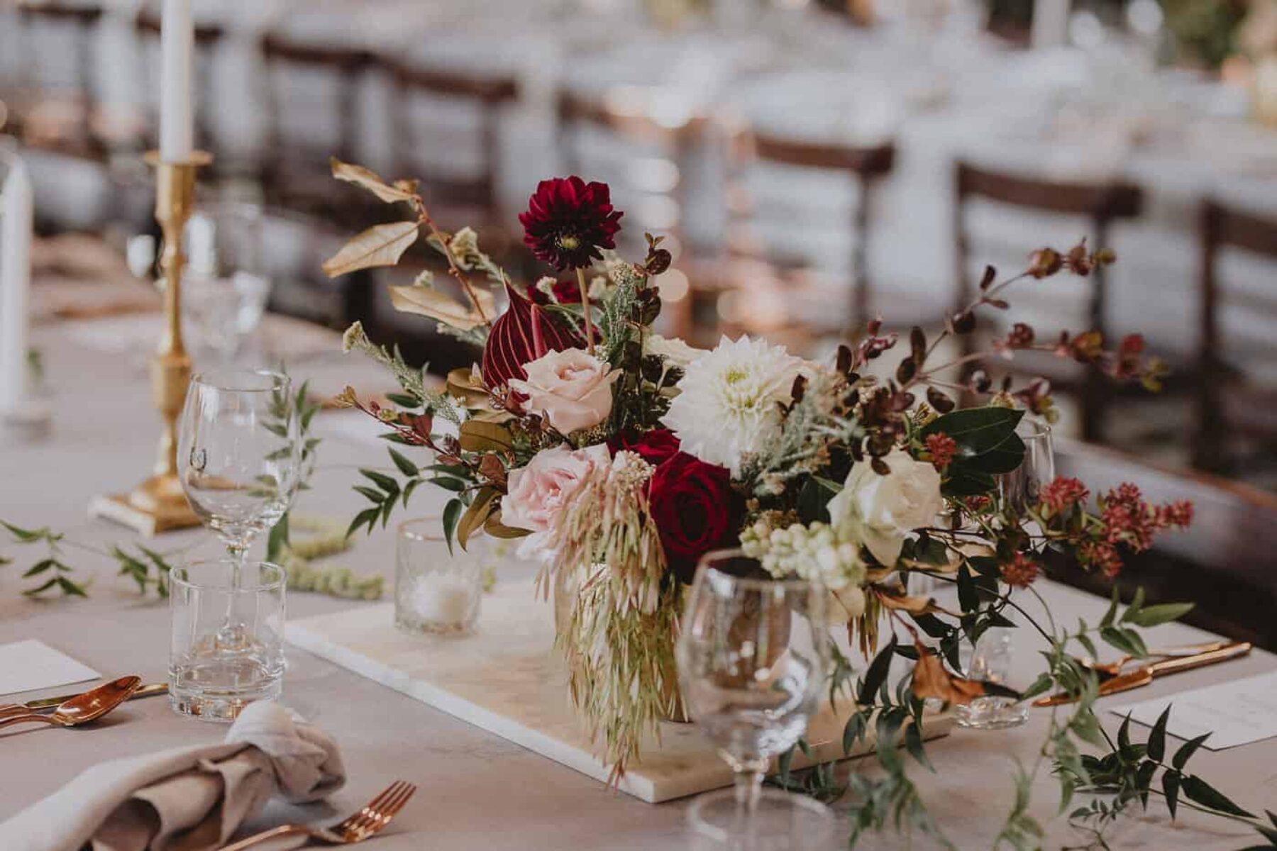blush and burgundy table flowers