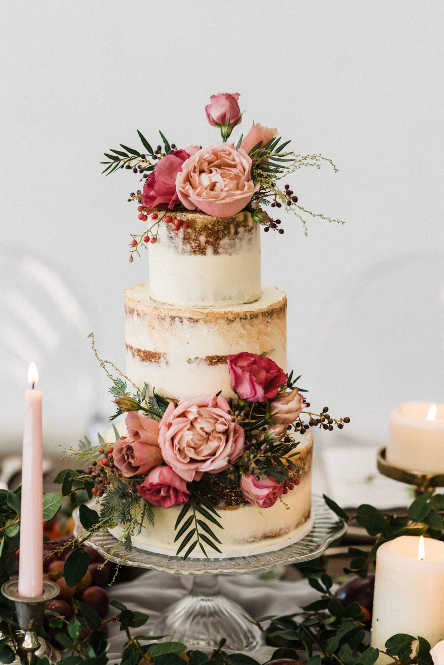semi-naked layer cake with pink flowers