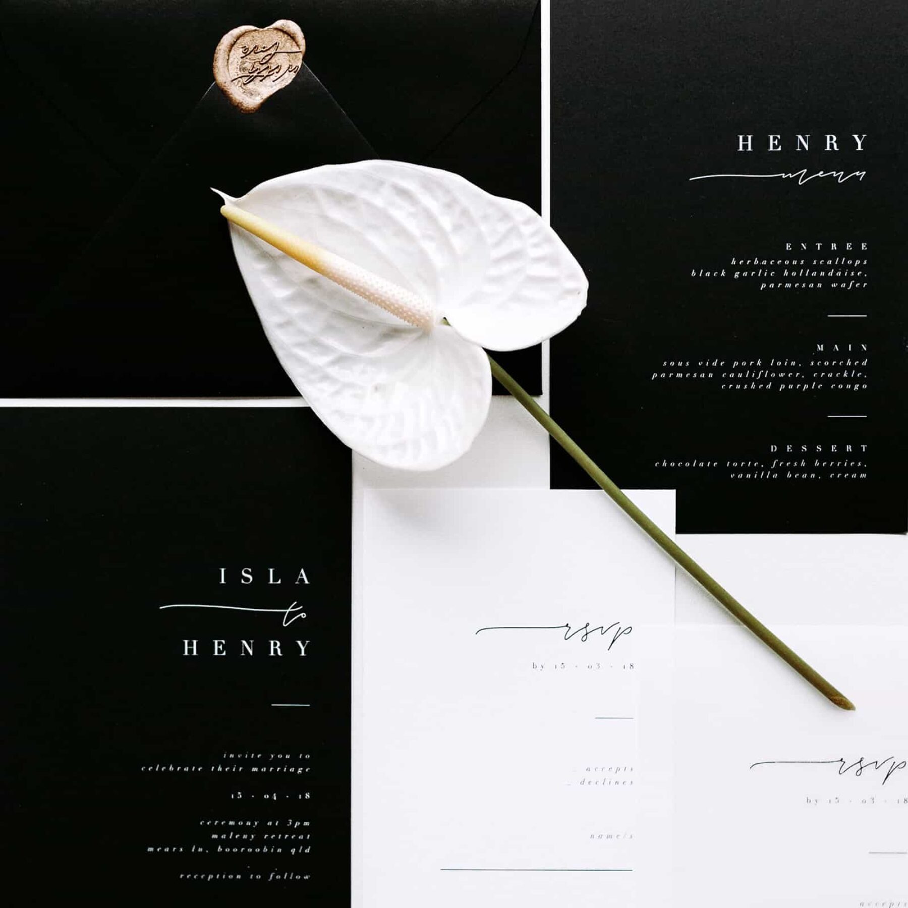 Monochromatic wedding stationery with gold accents