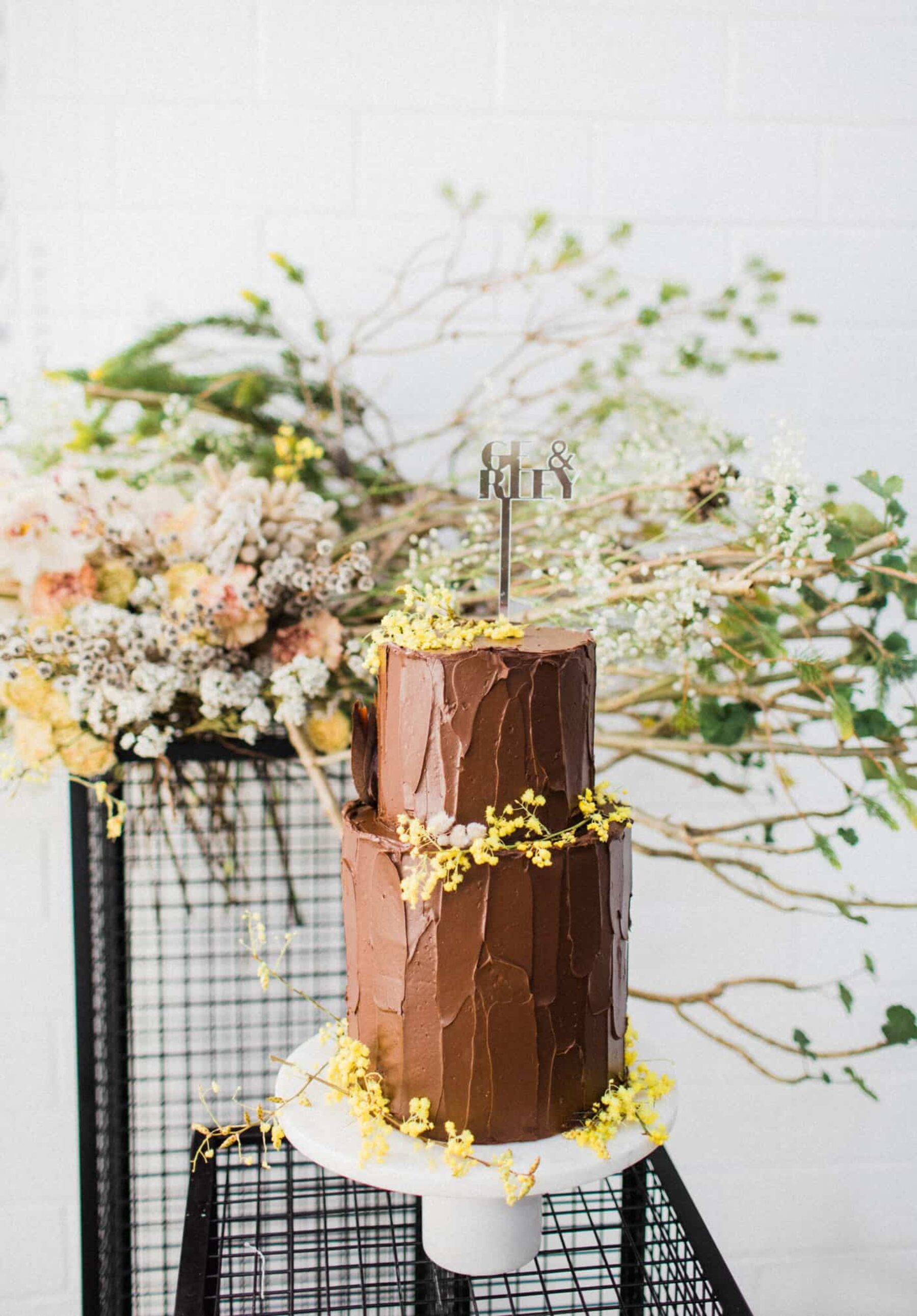 chocolate wedding cake with native flowers