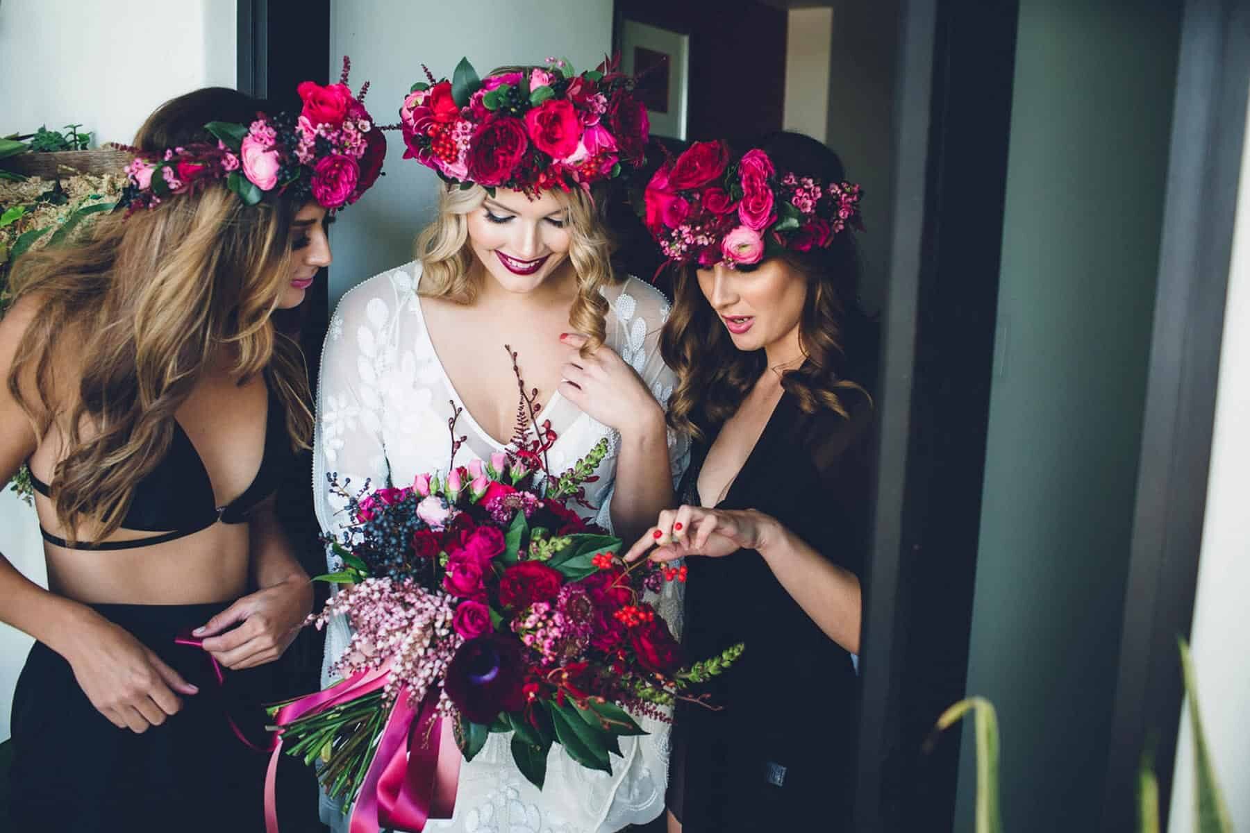 bridesmaids with magenta flower crowns