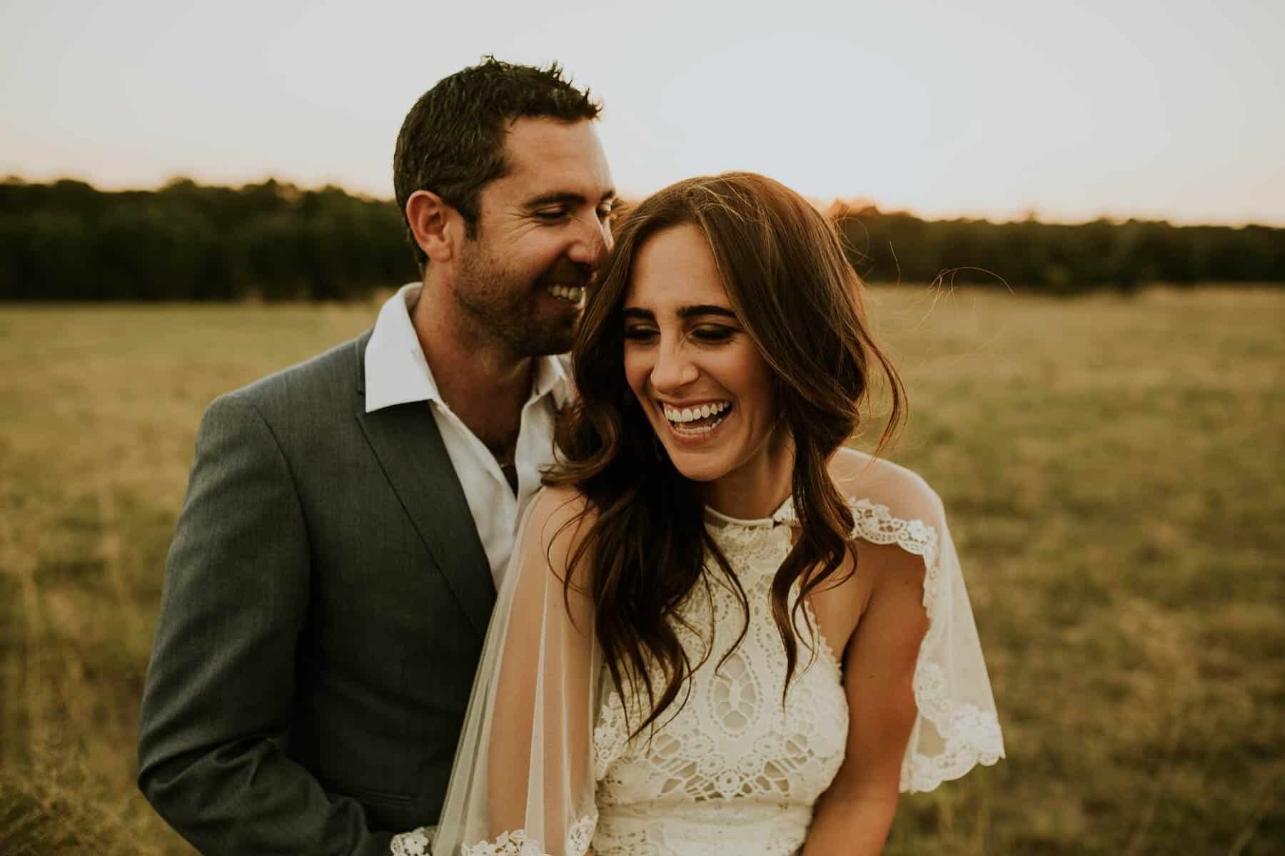 boho bride in lace wedding dress and cape by Spell Designs