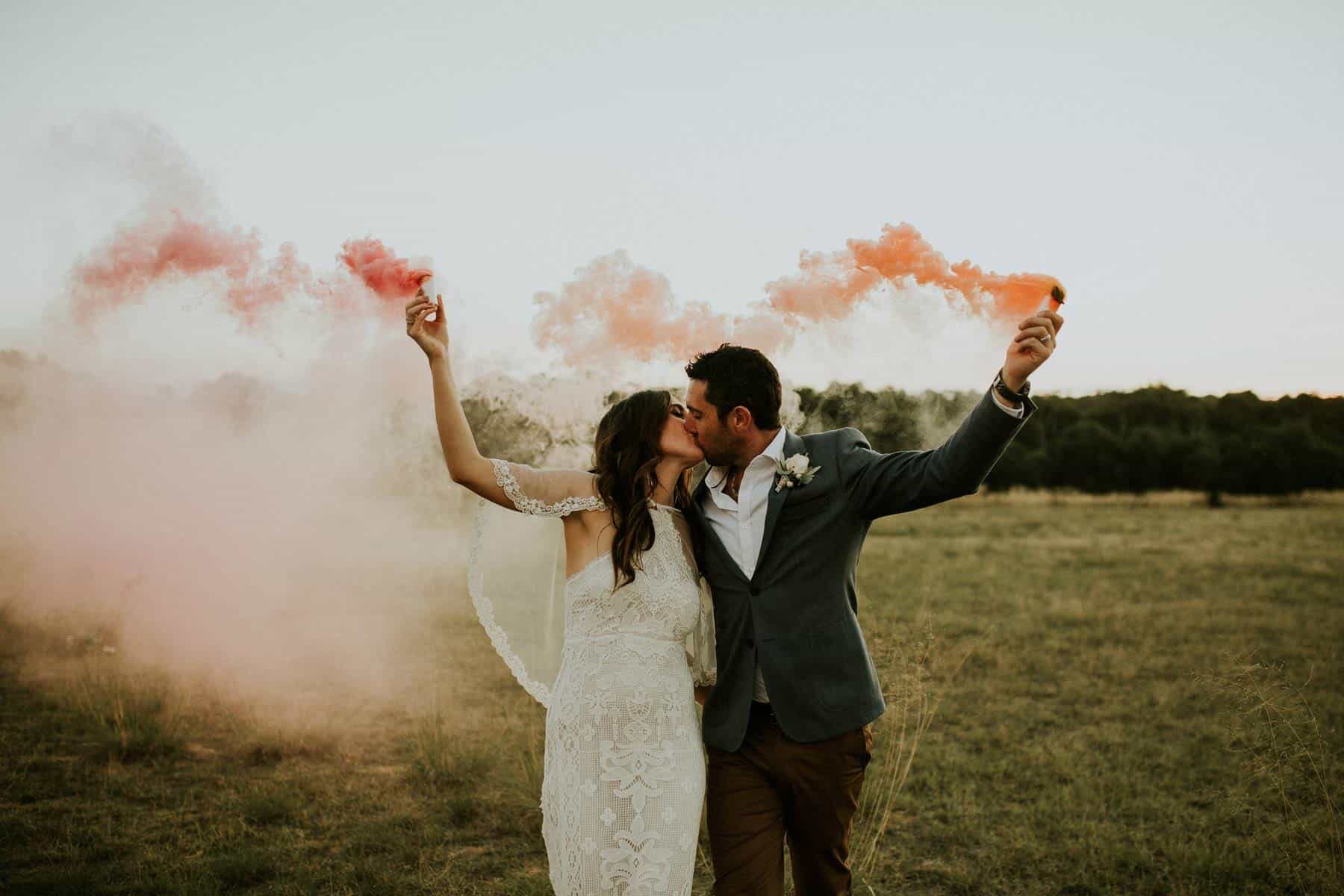 wedding photography with pink smoke bombs