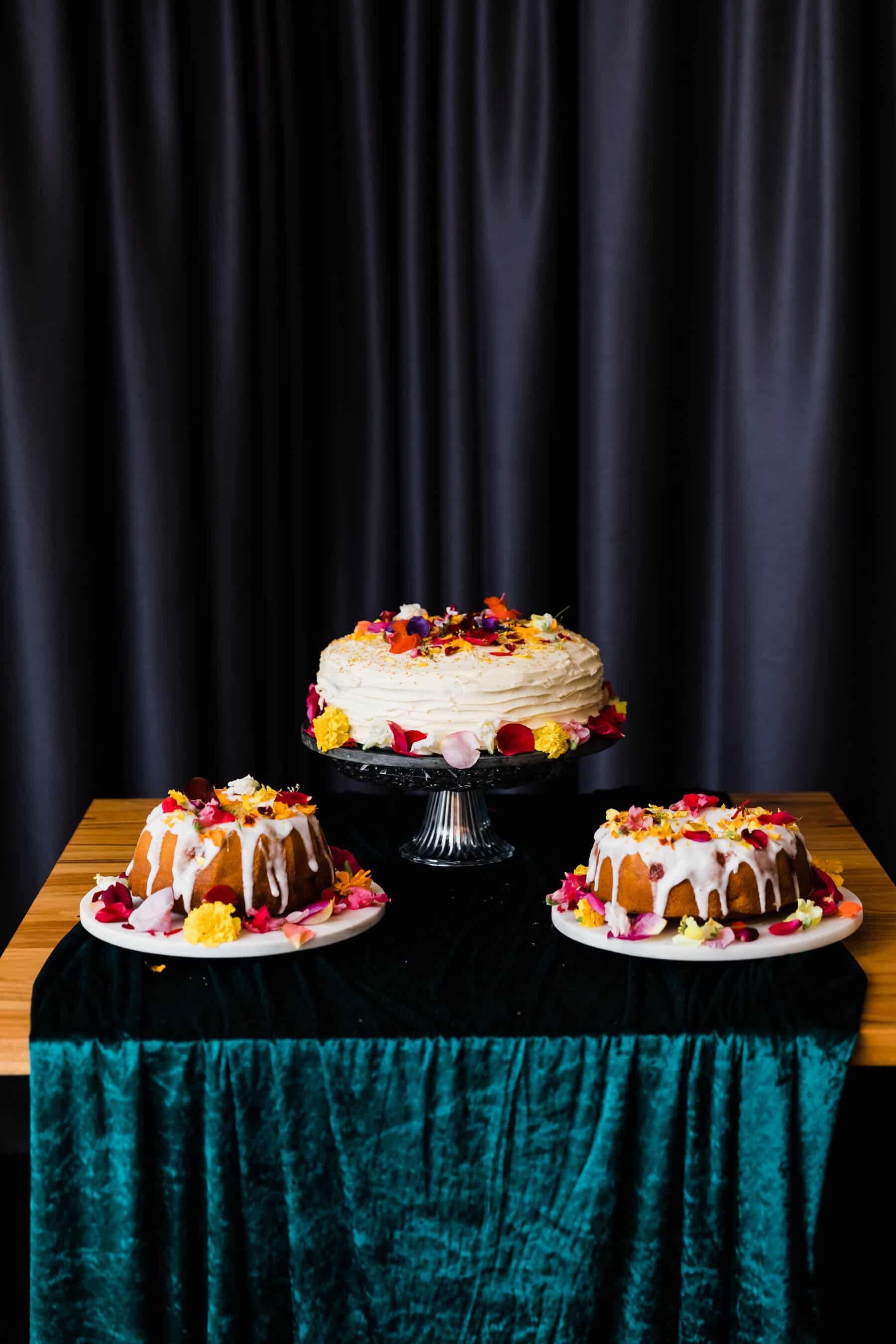 trio of homemade wedding cakes