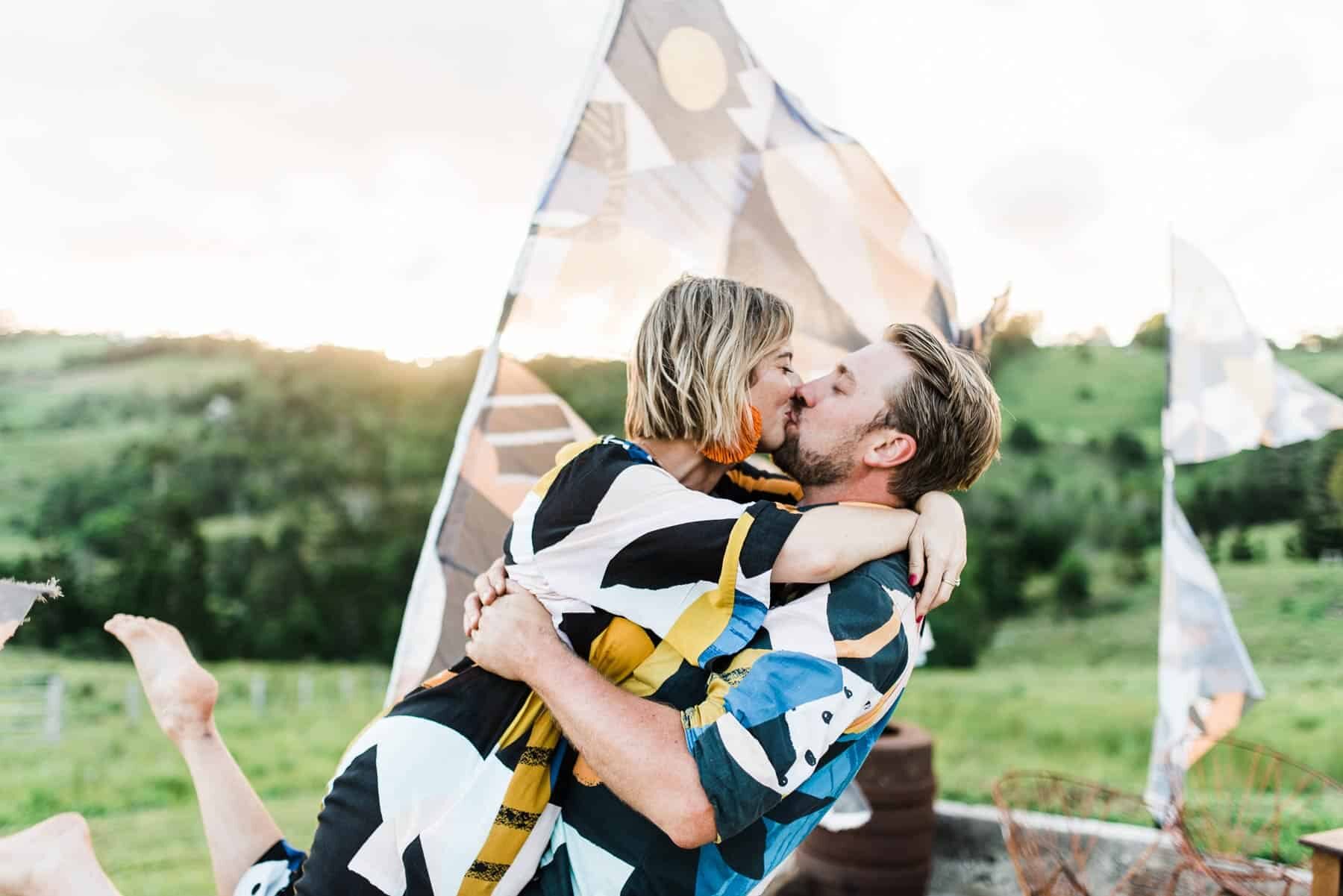 bride and groom in bold graphic prints