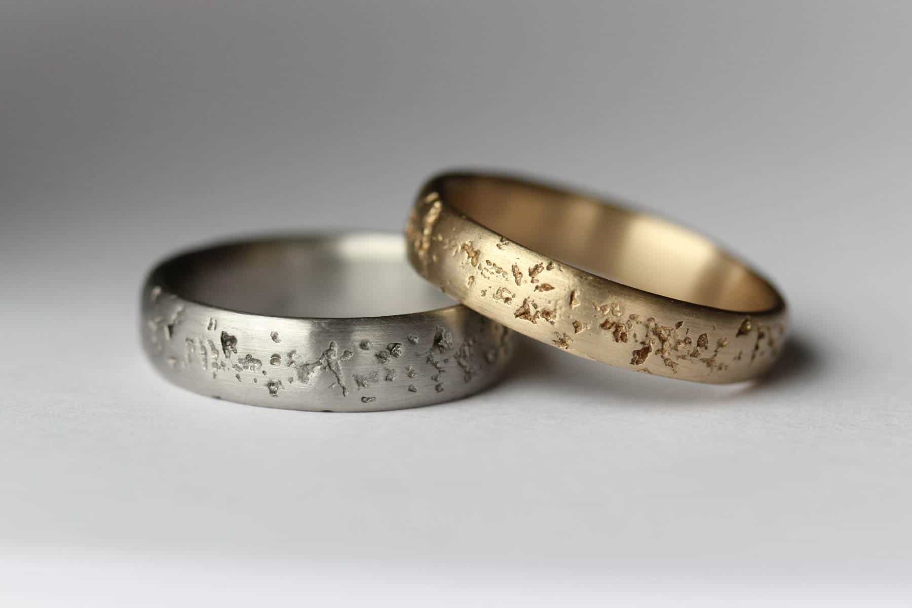 silver and gold textured handmade wedding bands