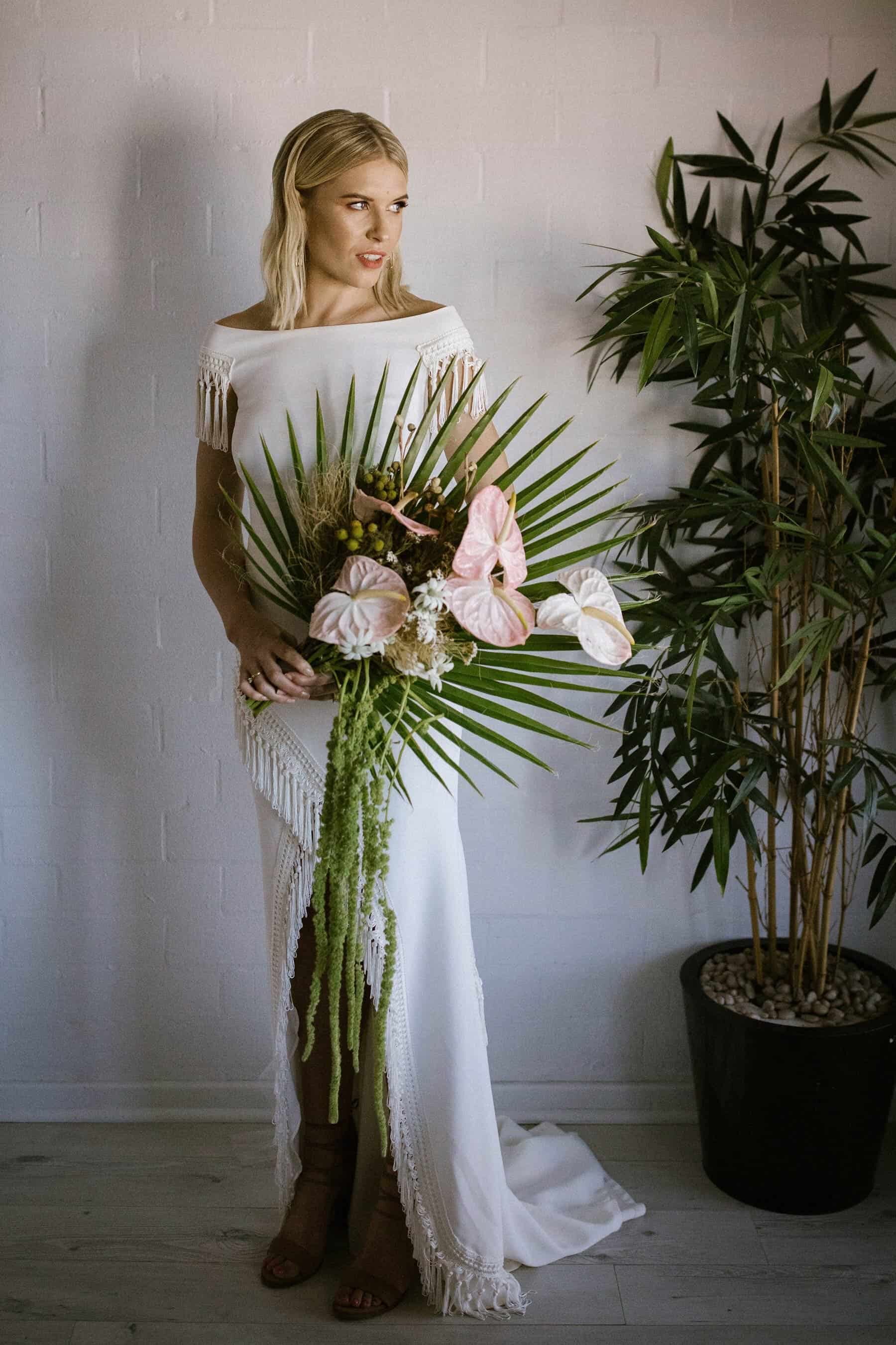 modern off-shoulder tassel-fringe wedding dress by Rue de Seine