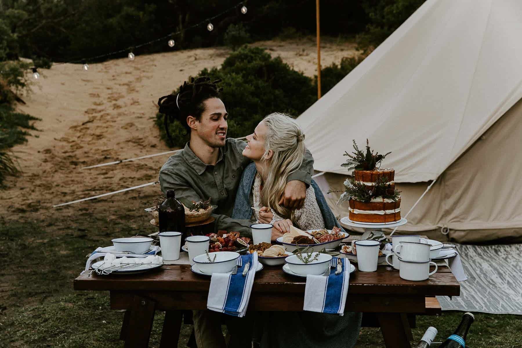 boho beach glamping elopement with vintage airstream caravan and bell tent