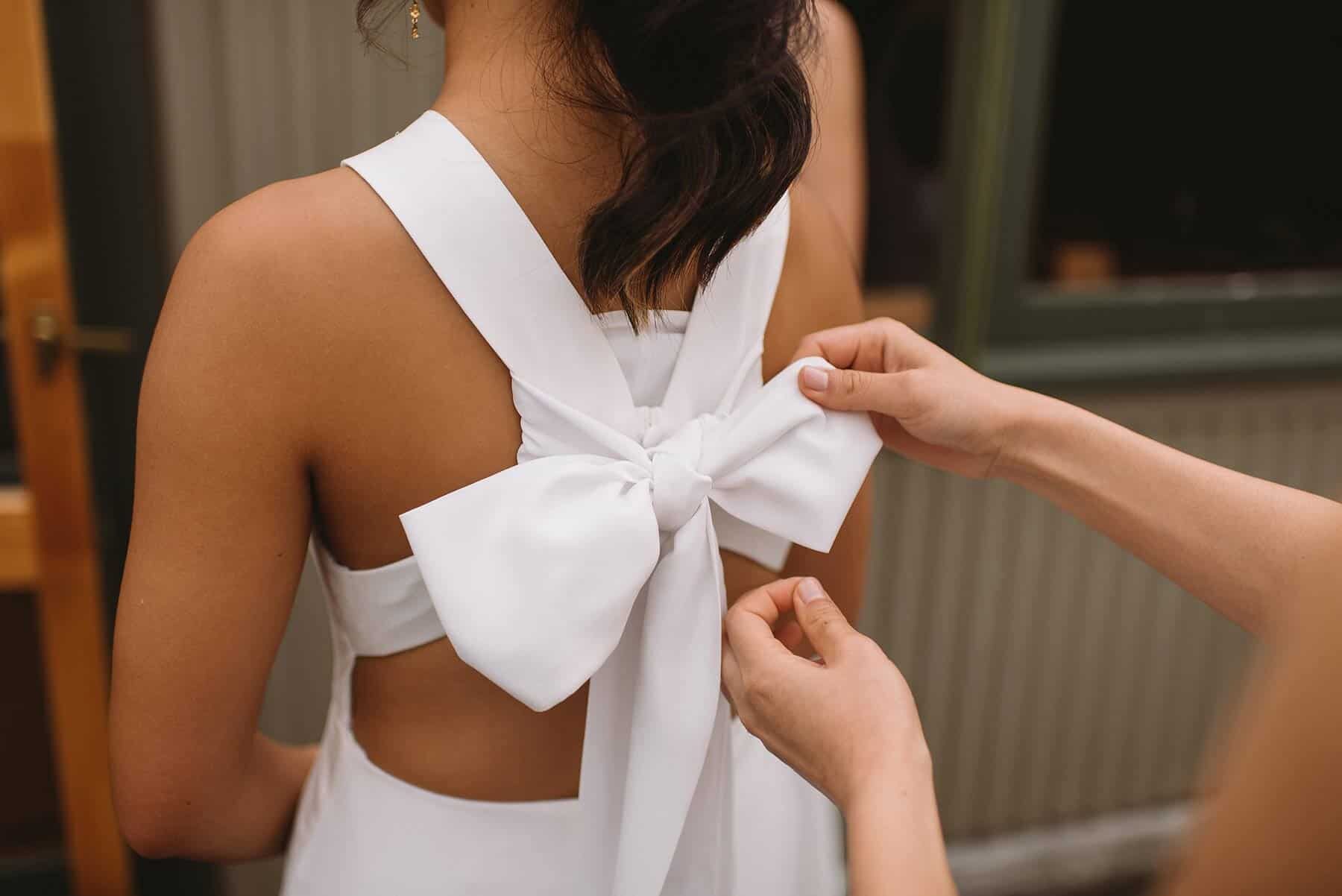 modern wedding dress with statement bow